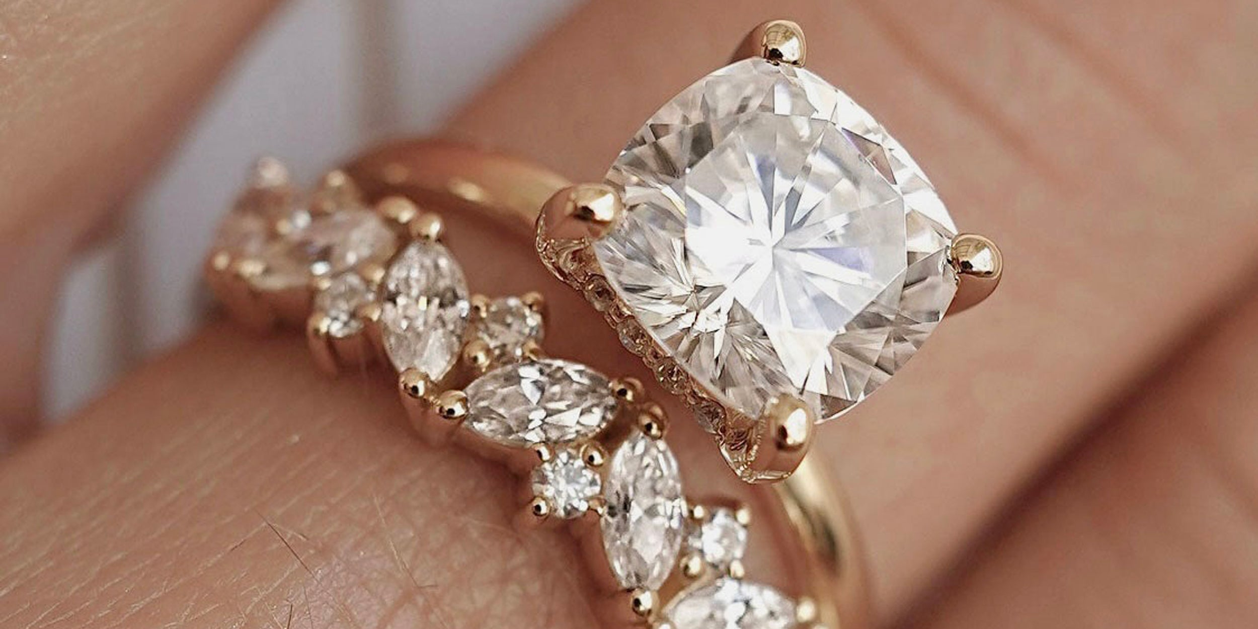cushion cut moissanite engagement ring with eternity band