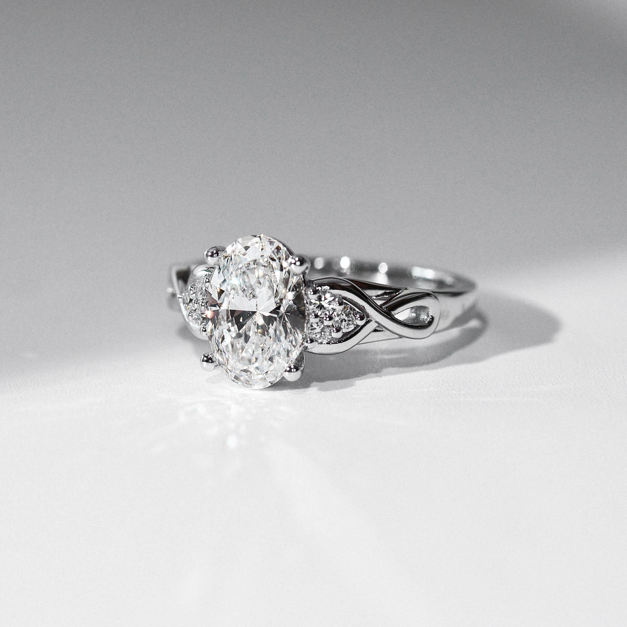 Serene Swan Oval Infinity Engagement Ring, Cathedral