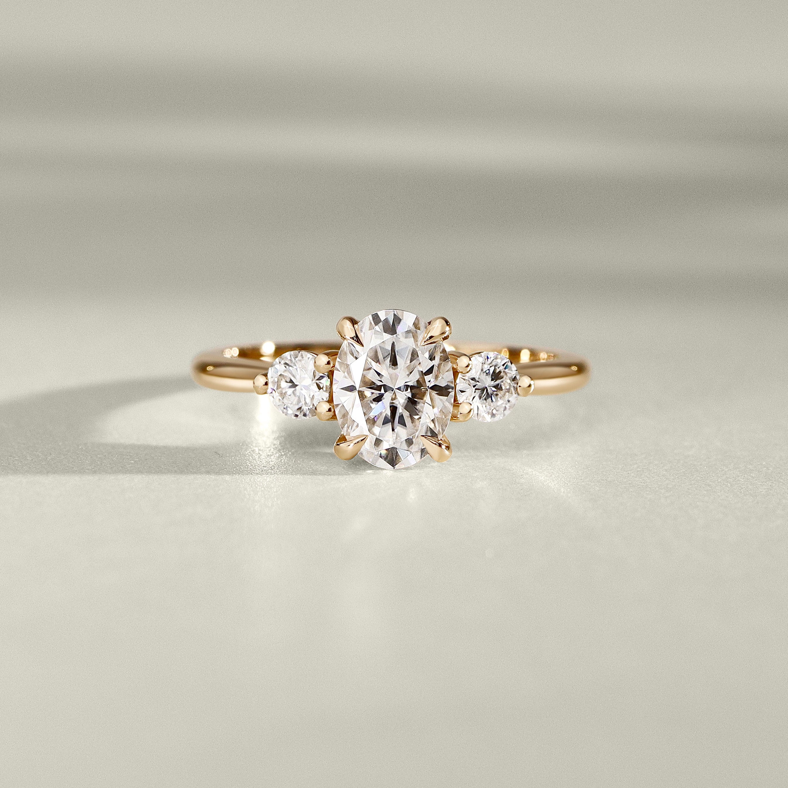 Olivia Three Stone Engagement Ring, Oval with Round Brilliant