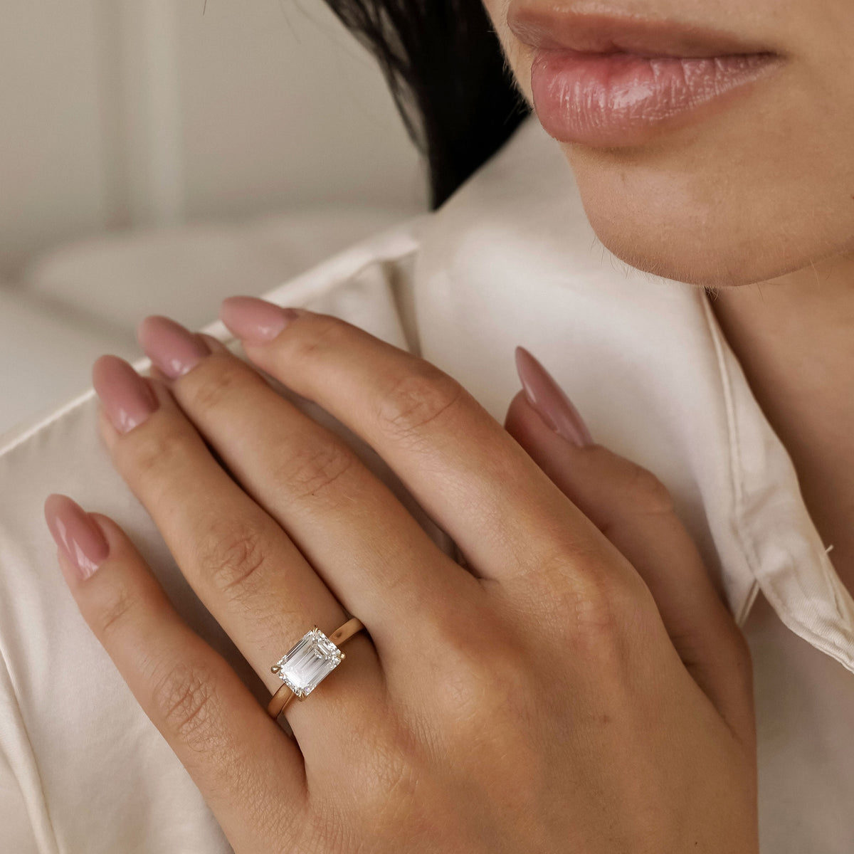 Lyra East West Emerald Cut Solitaire Cathedral Engagement Ring