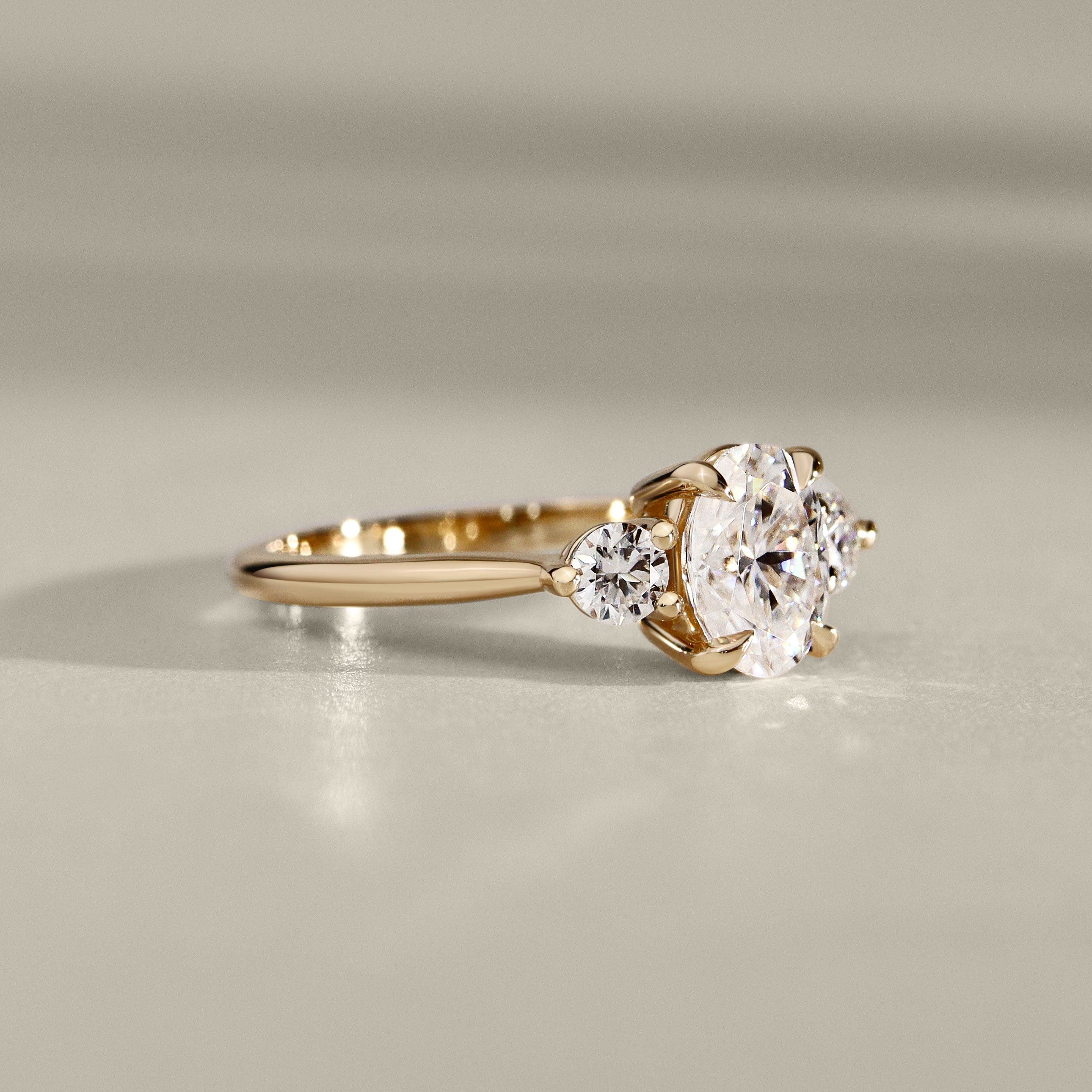 Olivia Three Stone Engagement Ring, Oval with Round Brilliant