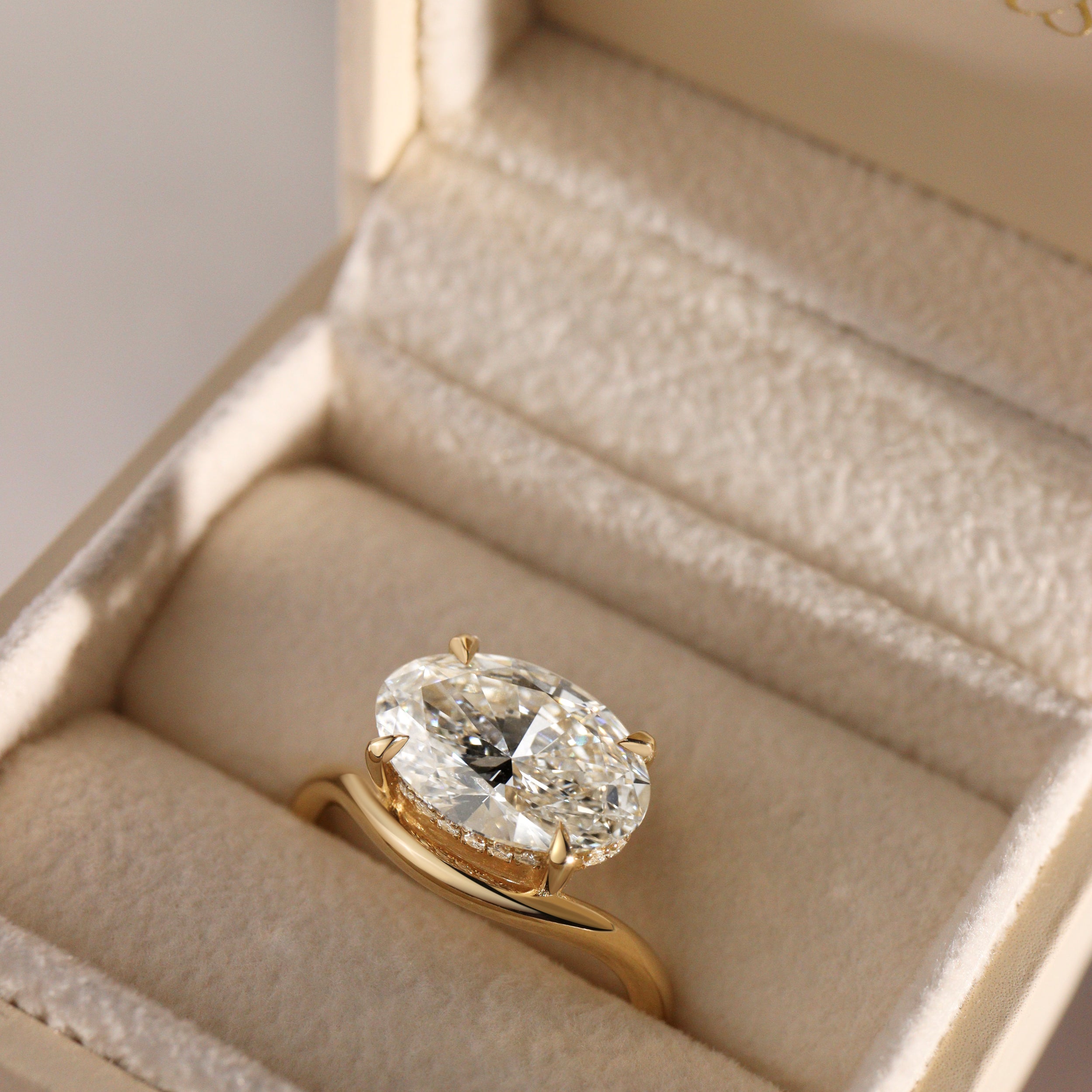 Orla Curved Band Solitaire Engagement Ring, Oval Cut