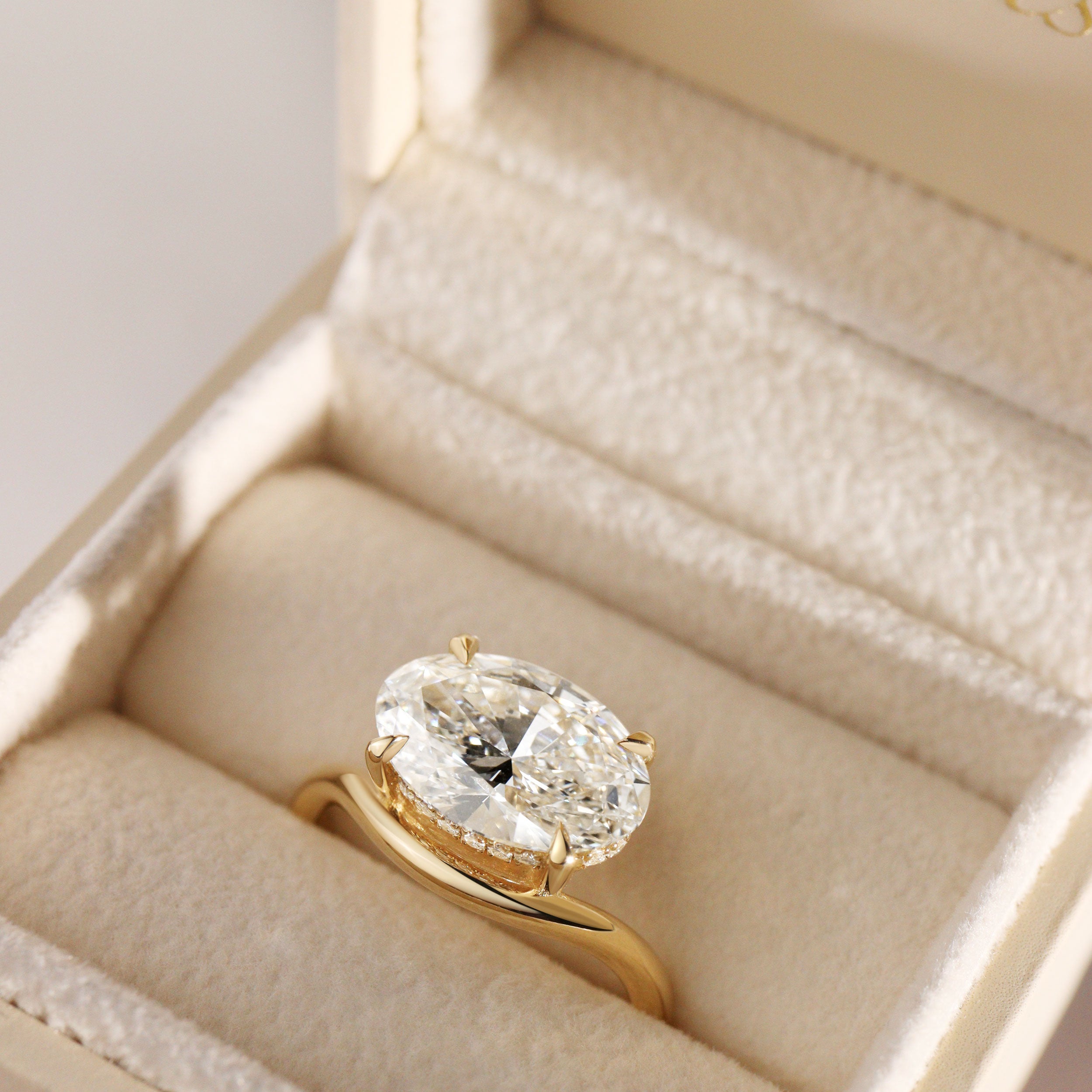 Orla Curved Band Solitaire Engagement Ring, Oval Cut