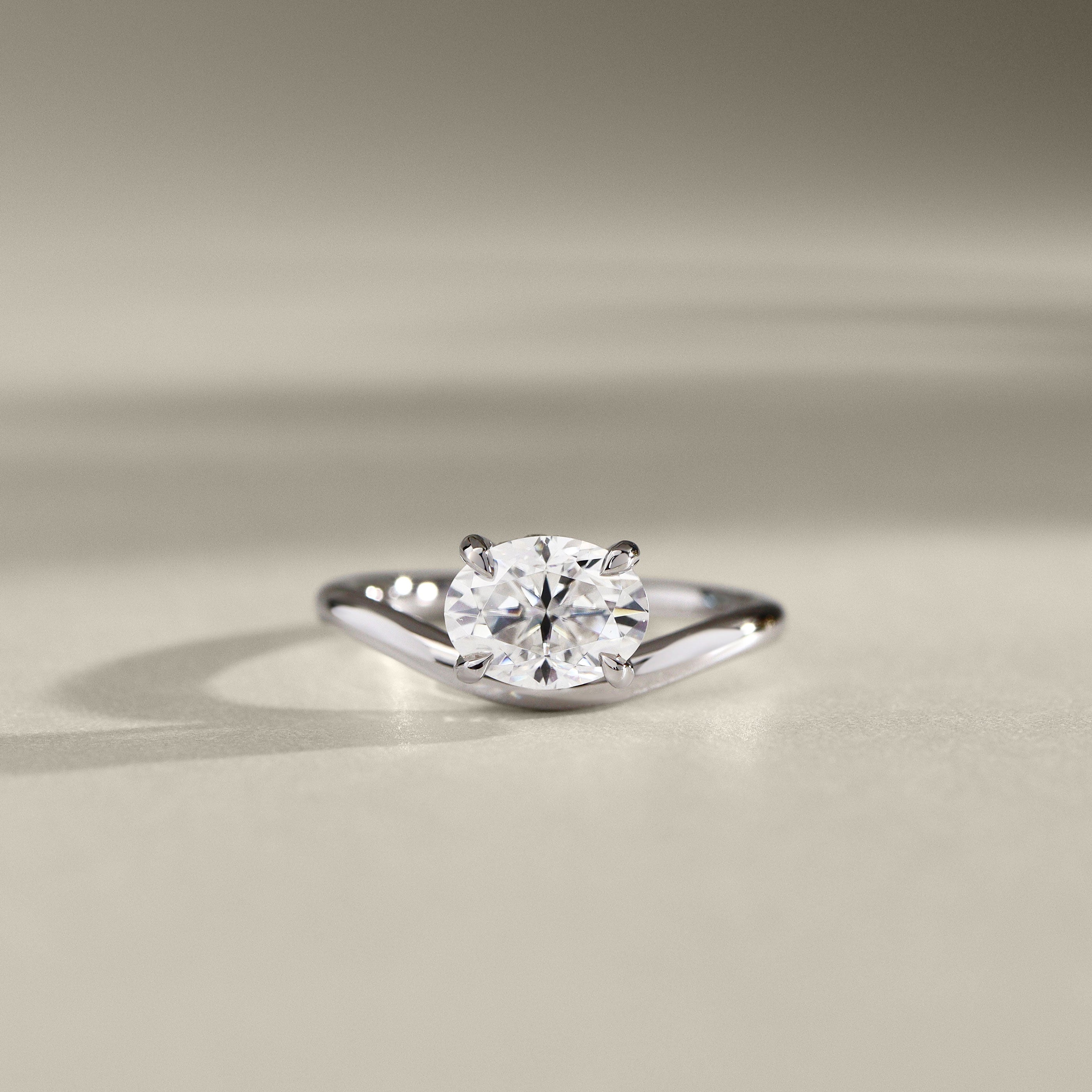 Orla Curved Band Solitaire Engagement Ring, Oval Cut