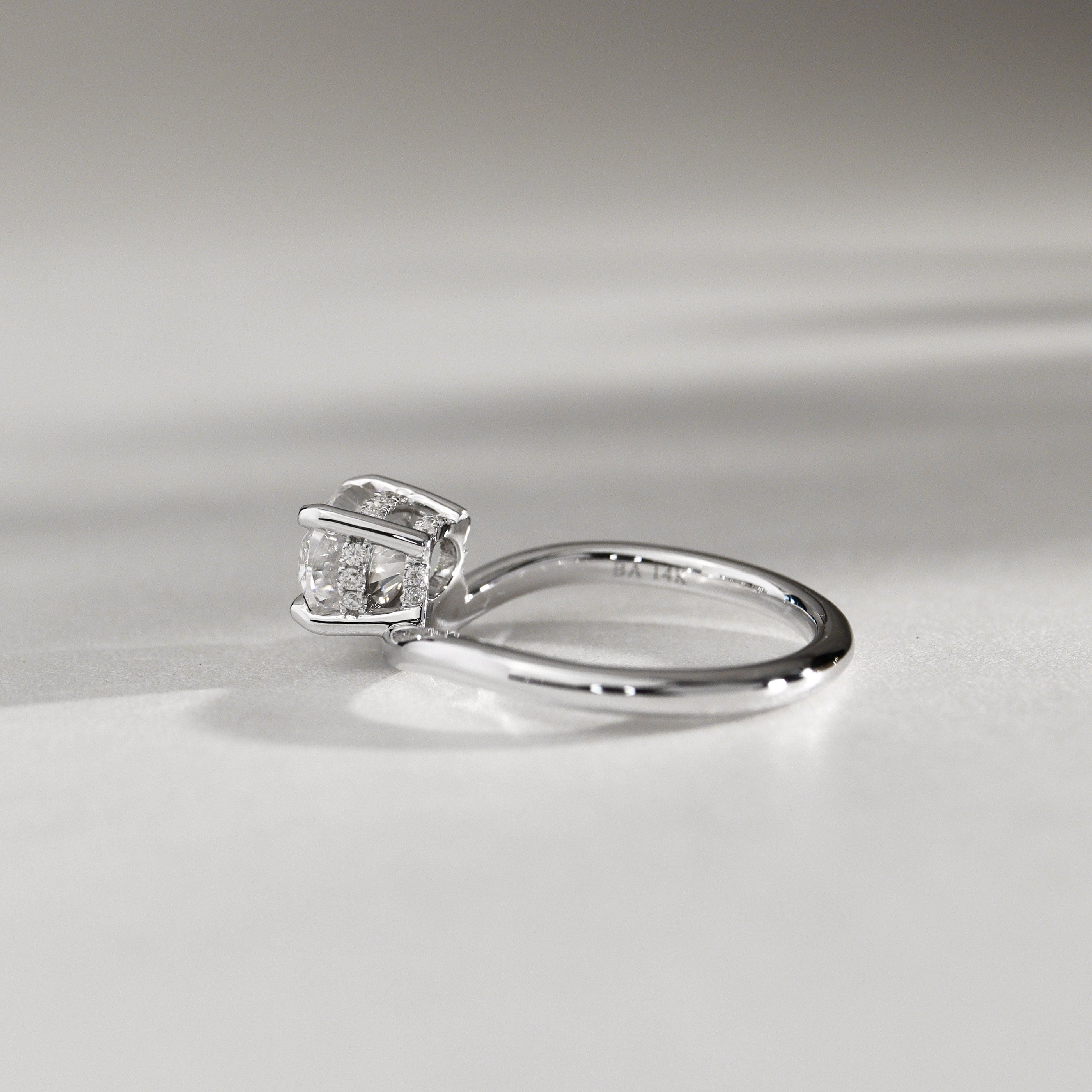 Orla Curved Band Solitaire Engagement Ring, Oval Cut