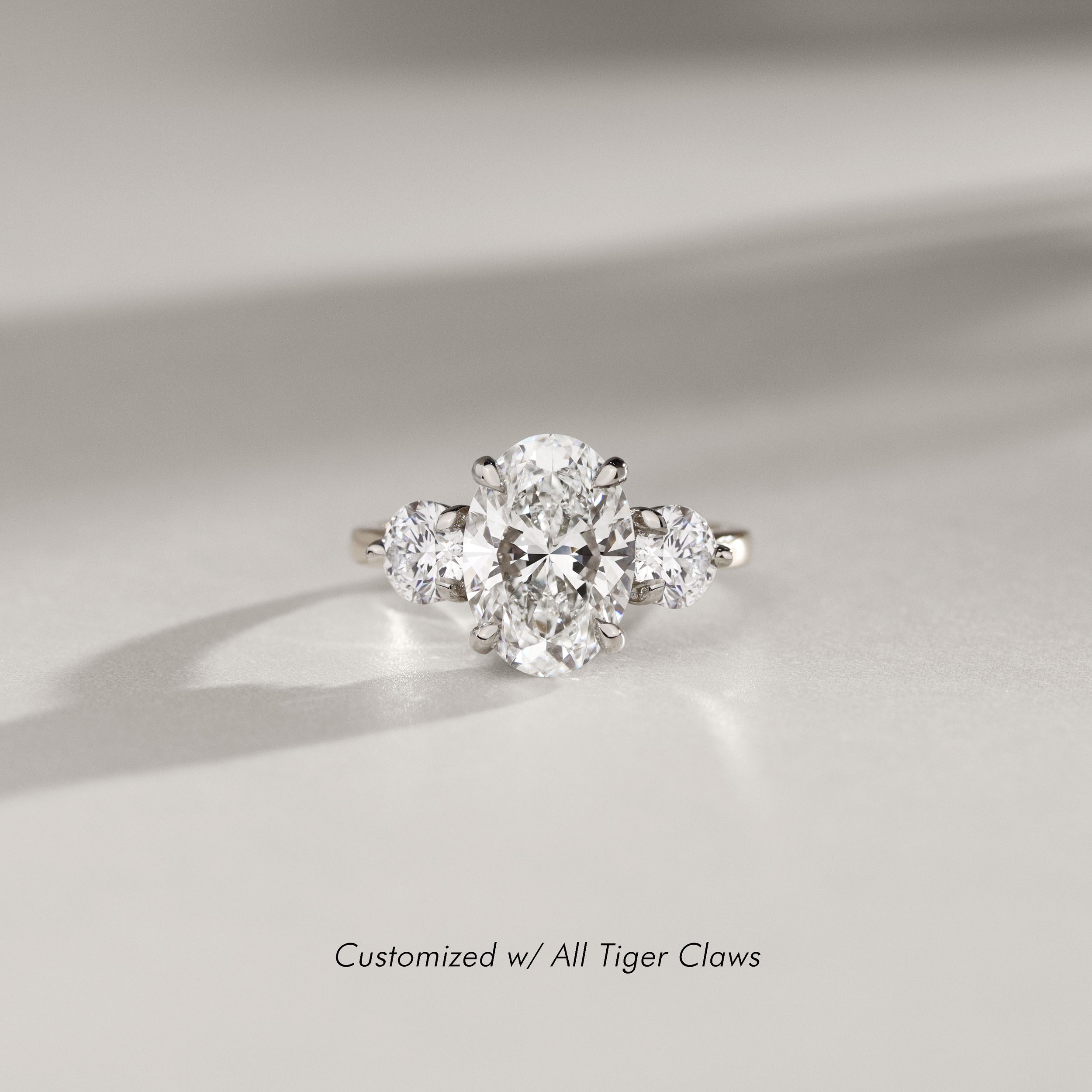 Olivia Three Stone Engagement Ring, Oval with Round Brilliant