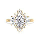 Oval halo engagement ring with marquise accent
