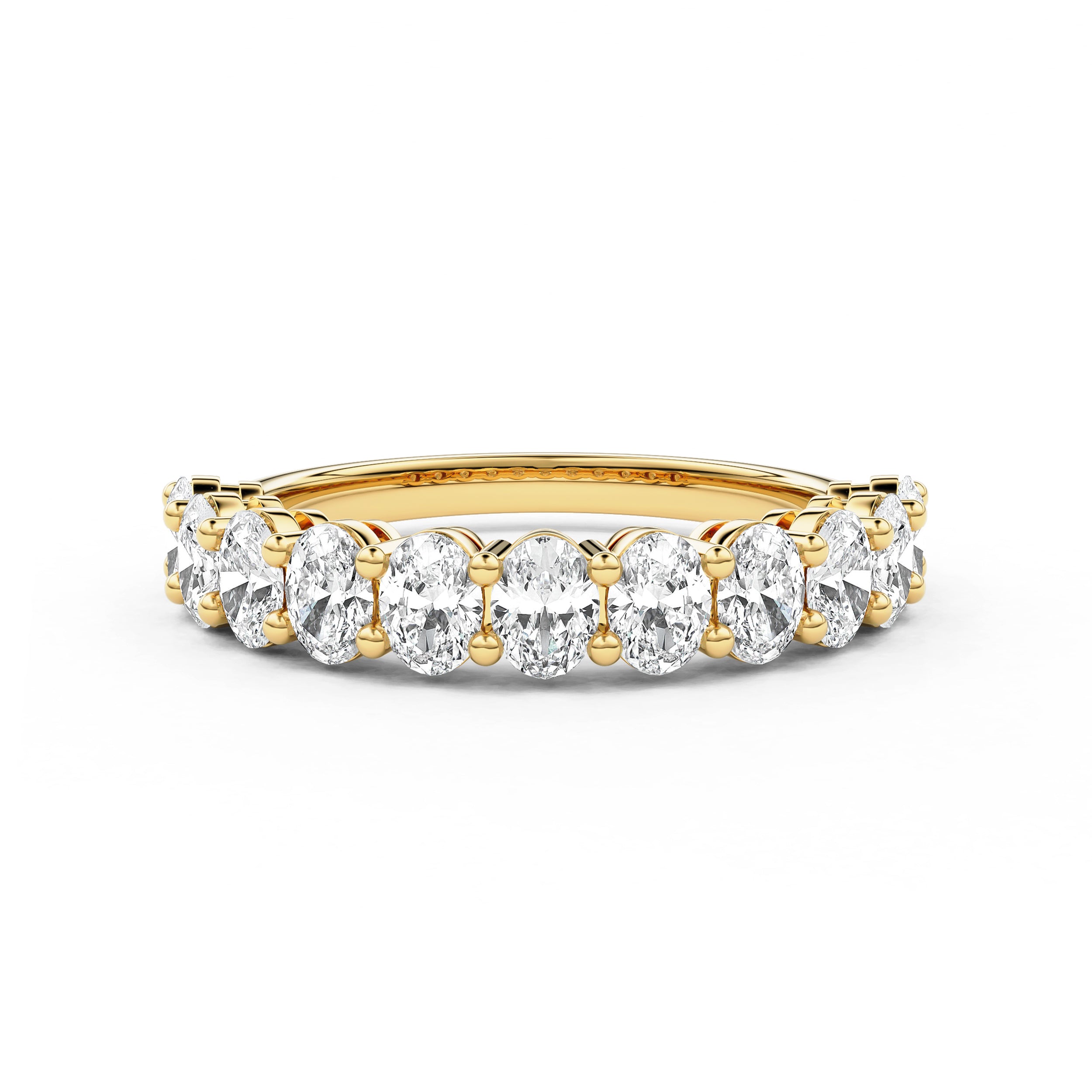 oval diamond share prong eternity wedding band in basket setting yellow gold