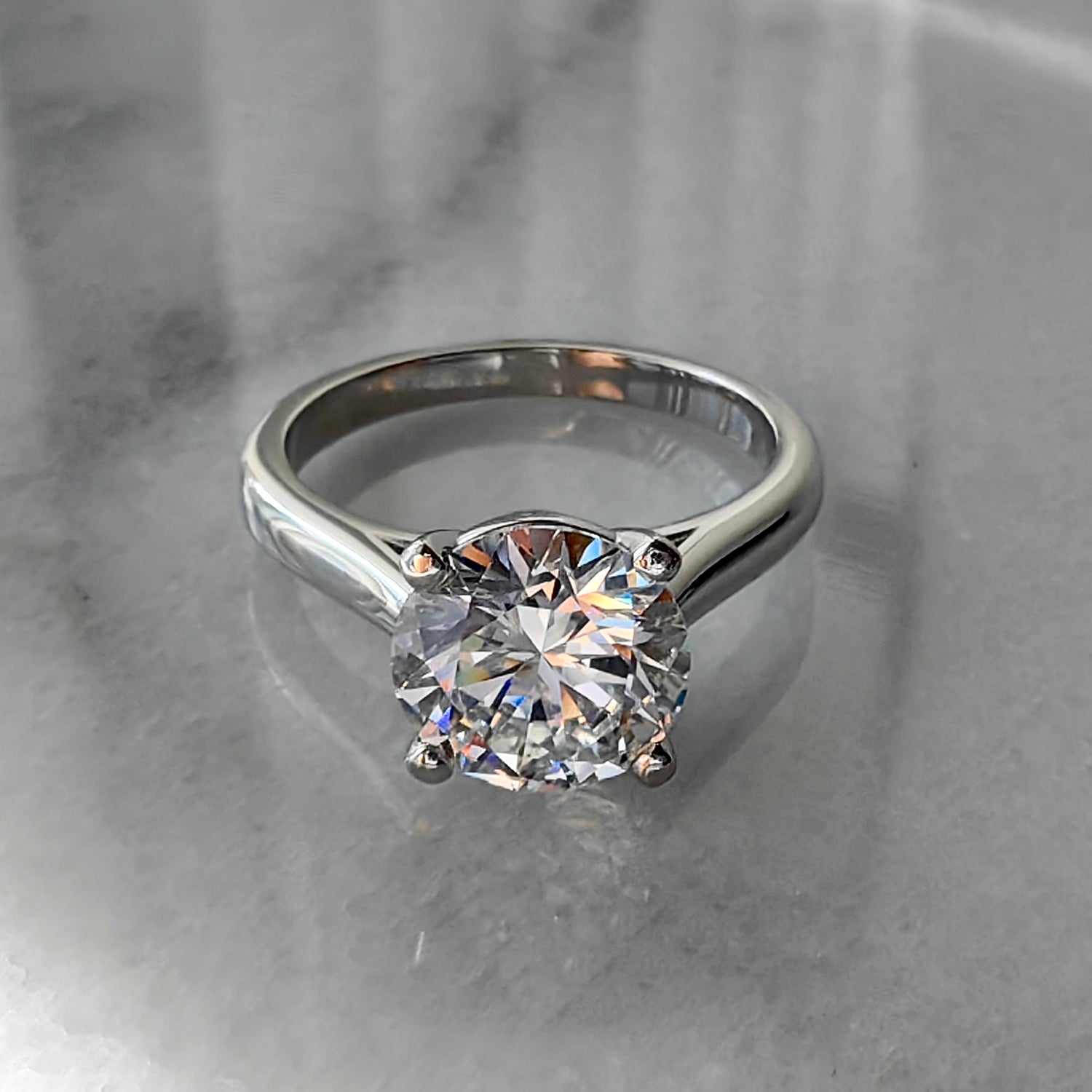 Claire Round Brilliant Cut Cathedral Solitaire Engagement Ring, Moissanite/Lab Grown Diamond