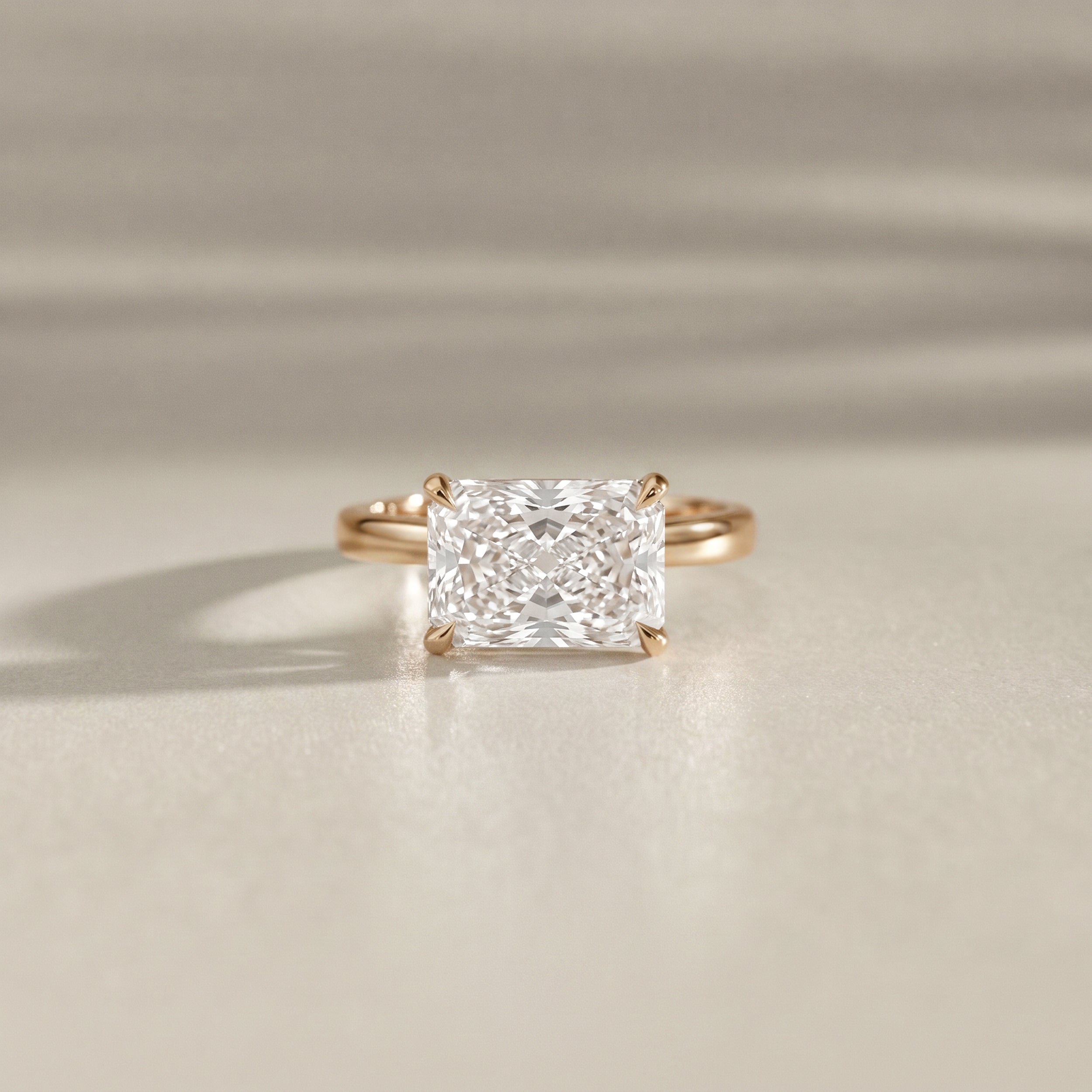 Lyra East West Radiant Cut Solitaire Cathedral Engagement Ring