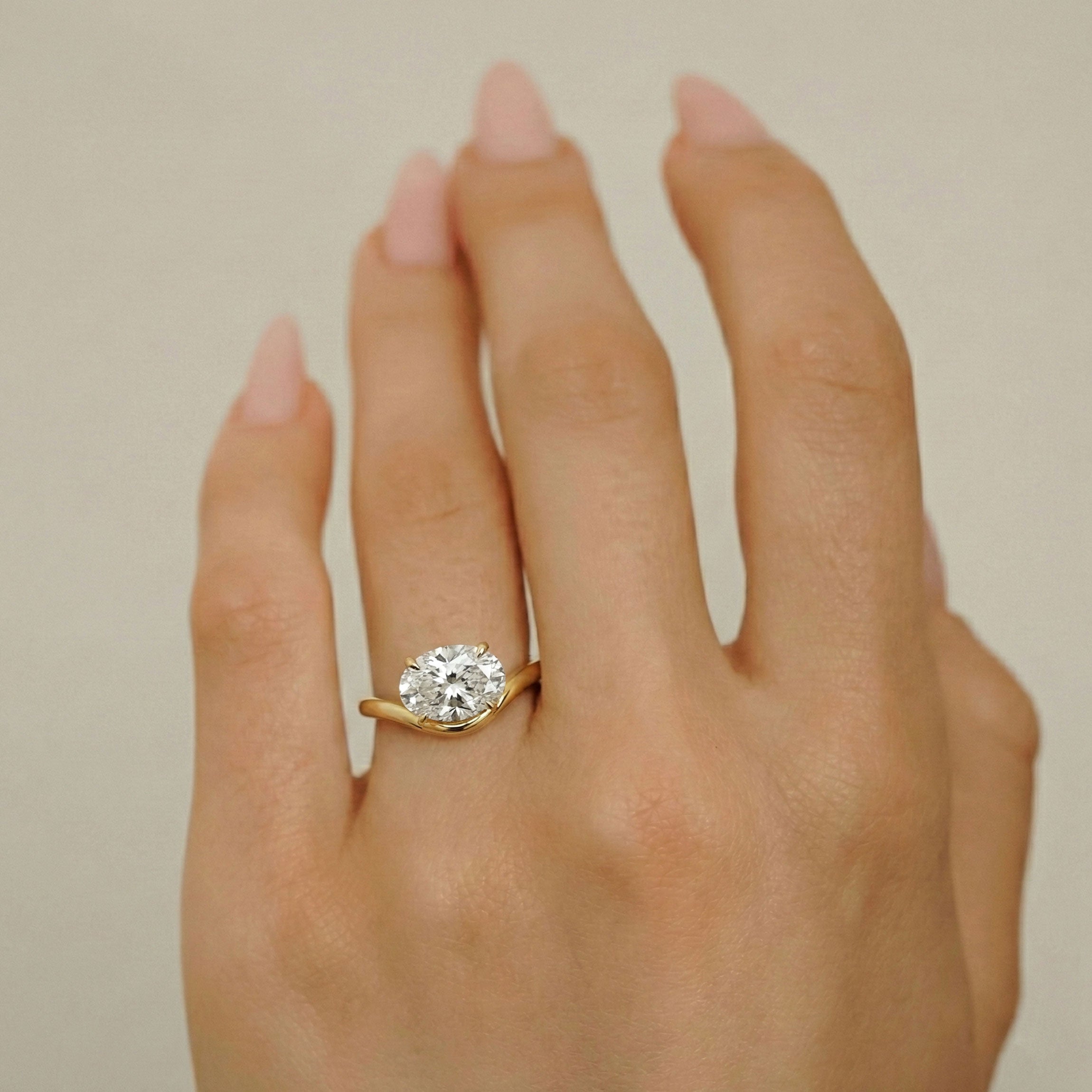 Orla Curved Band Solitaire Engagement Ring, Oval Cut