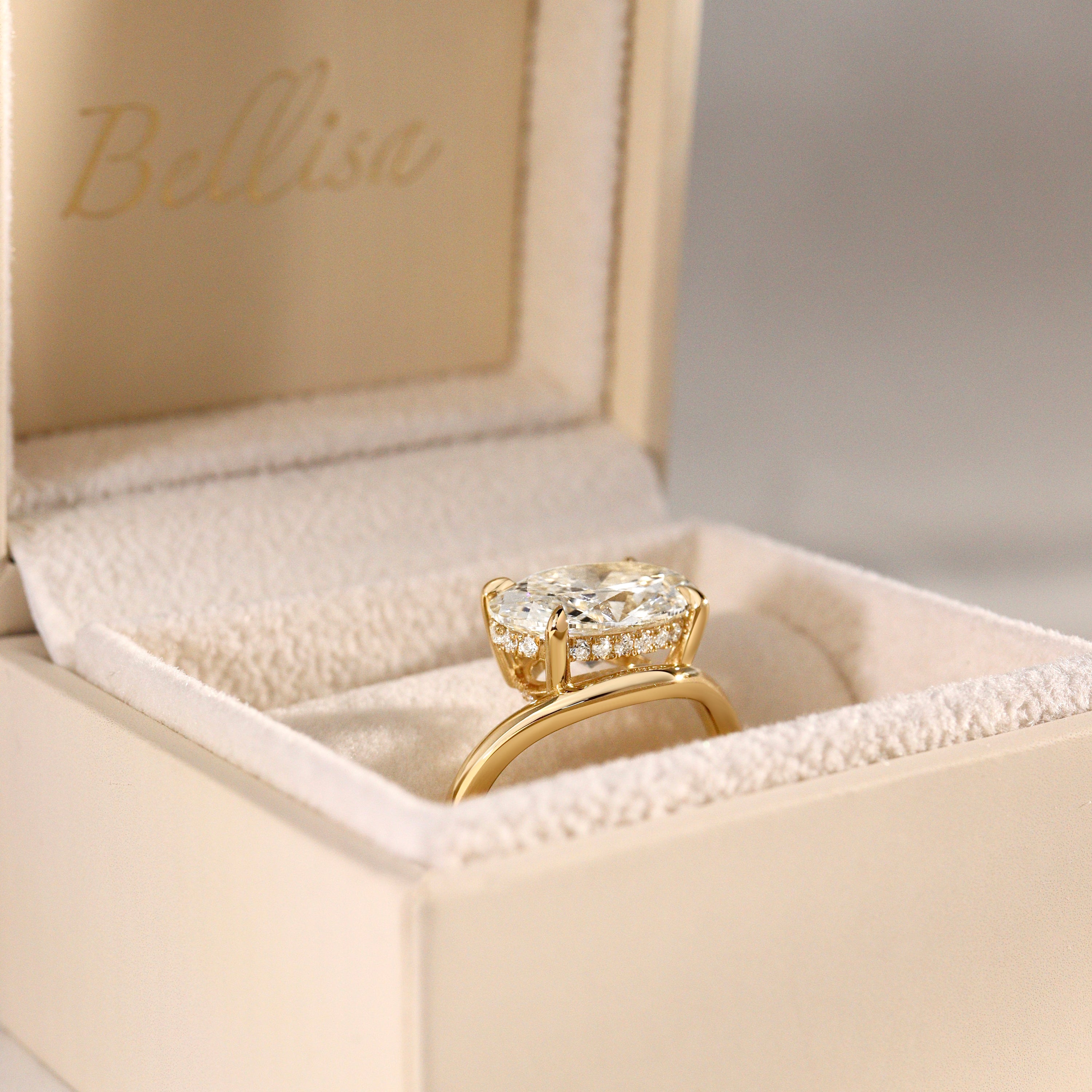 Orla Curved Band Solitaire Engagement Ring, Oval Cut