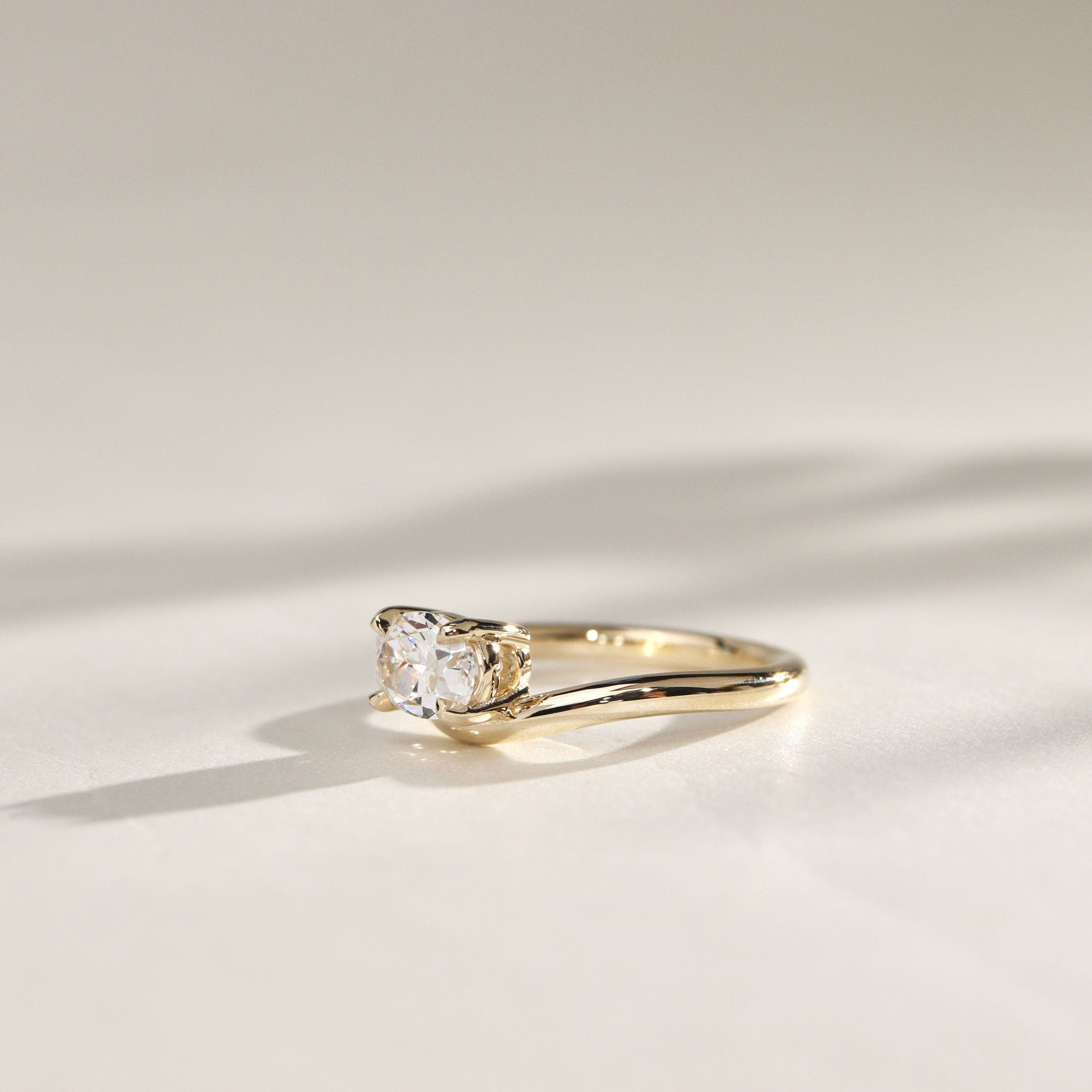 Orla Curved Band Solitaire Engagement Ring, Oval Cut