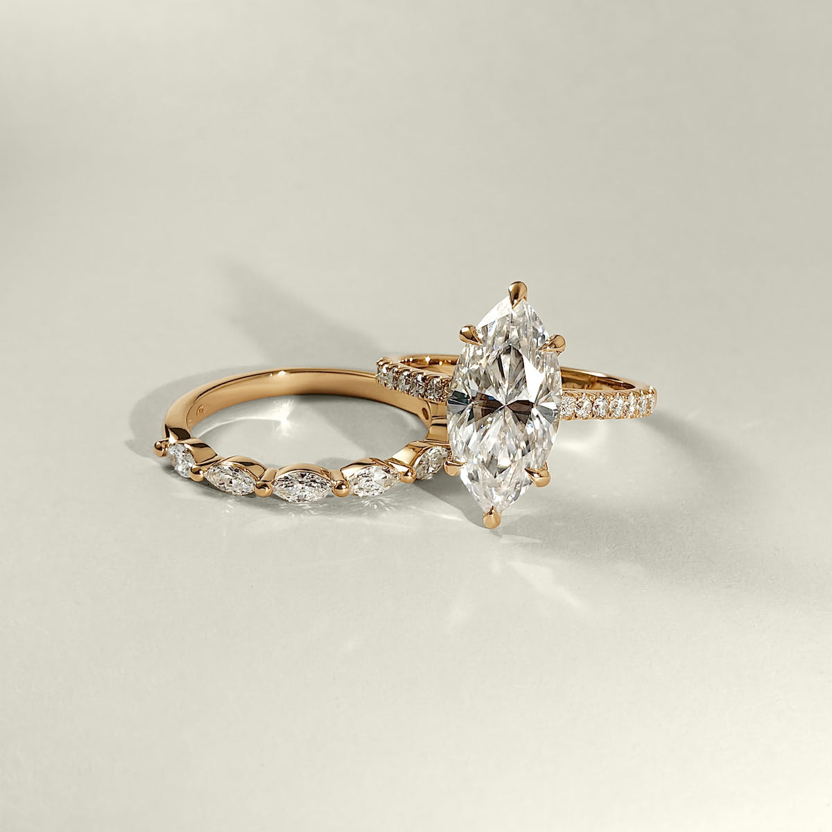 marquise cut moissanite engagement ring with marquise diamond eternity ring
