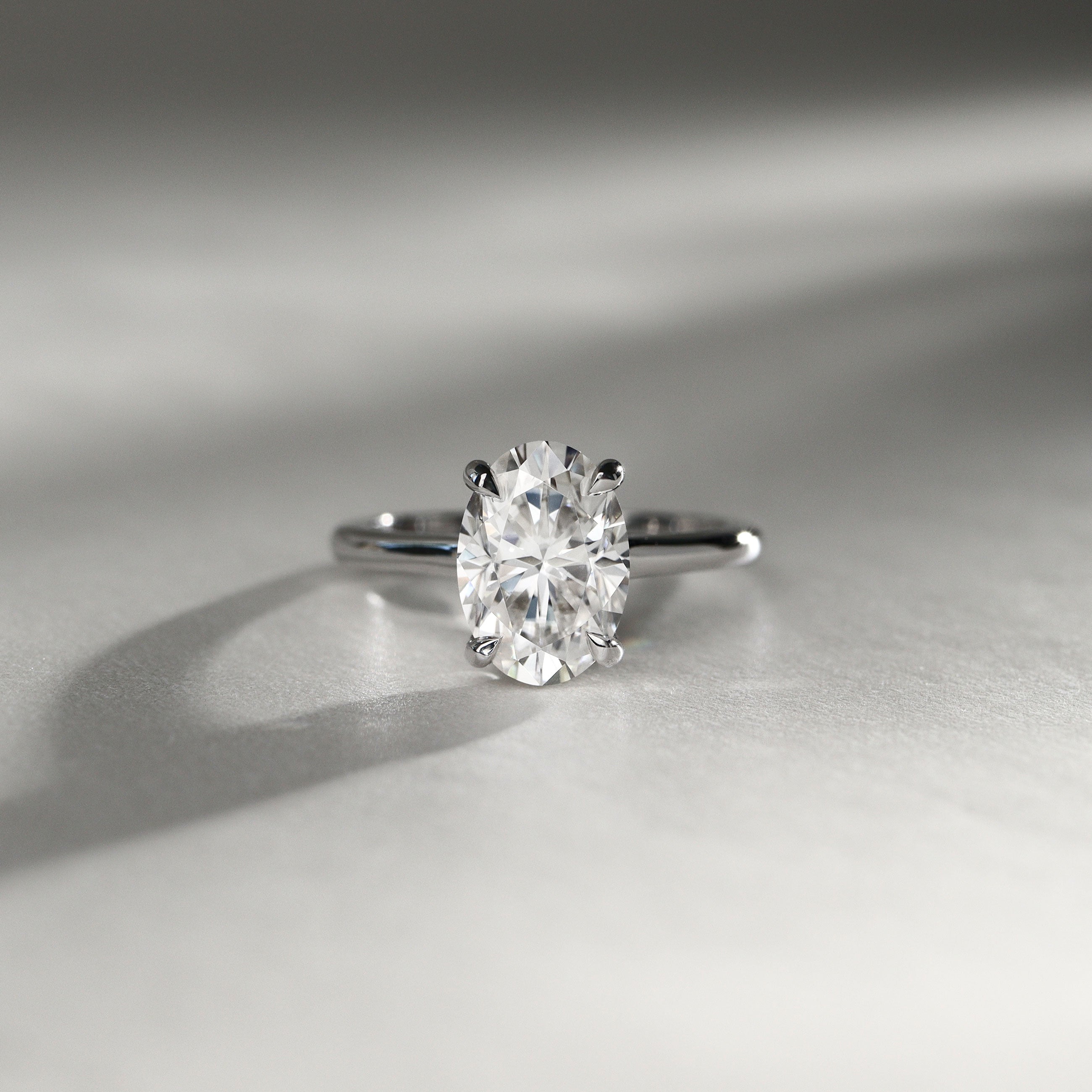 Ivy Oval Cut Hidden Halo Solitaire Engagement Ring, Cathedral Band