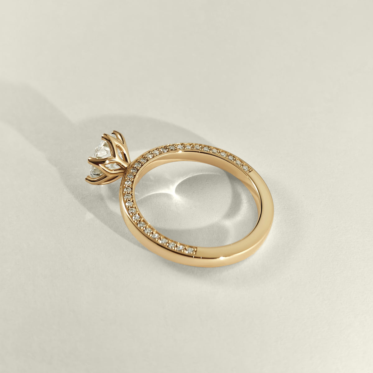 side profile pave band petal basket engagement ring