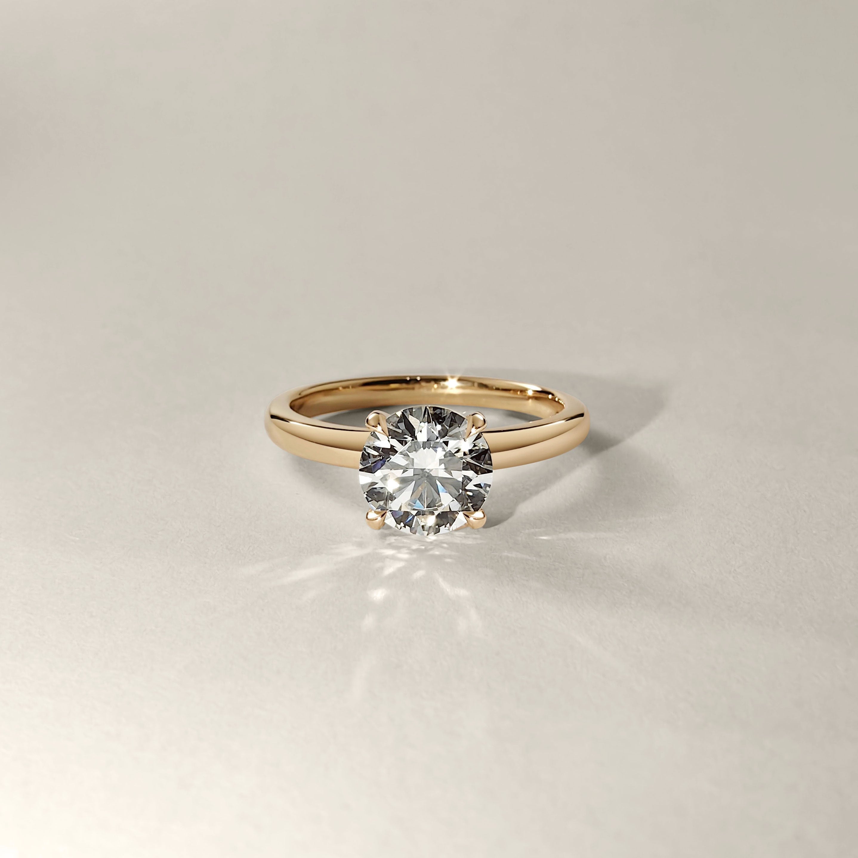 Solo Round Tapered Solitaire Engagement Ring