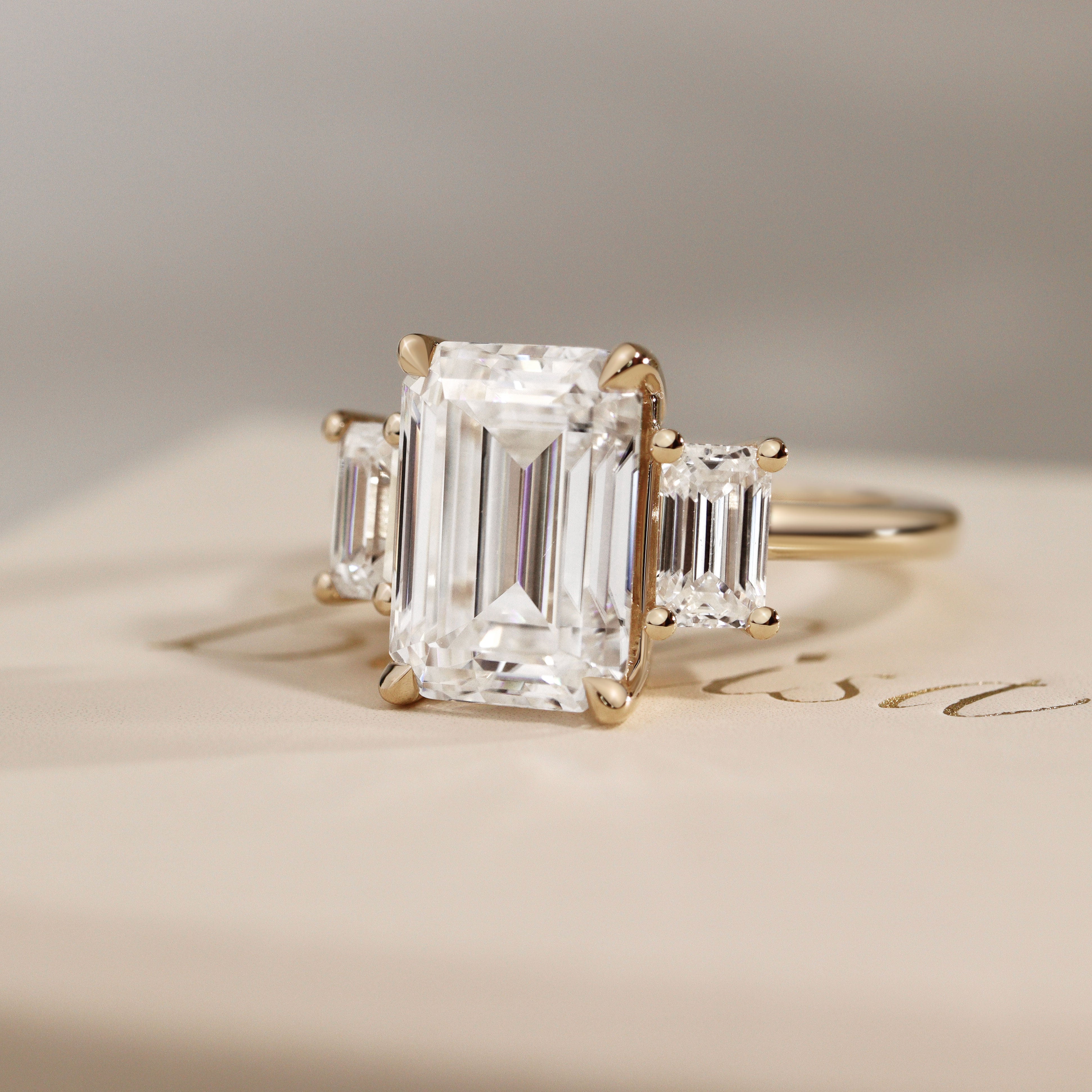 Evelyn Emerald Cut Three Stone Engagement Ring, Low Set