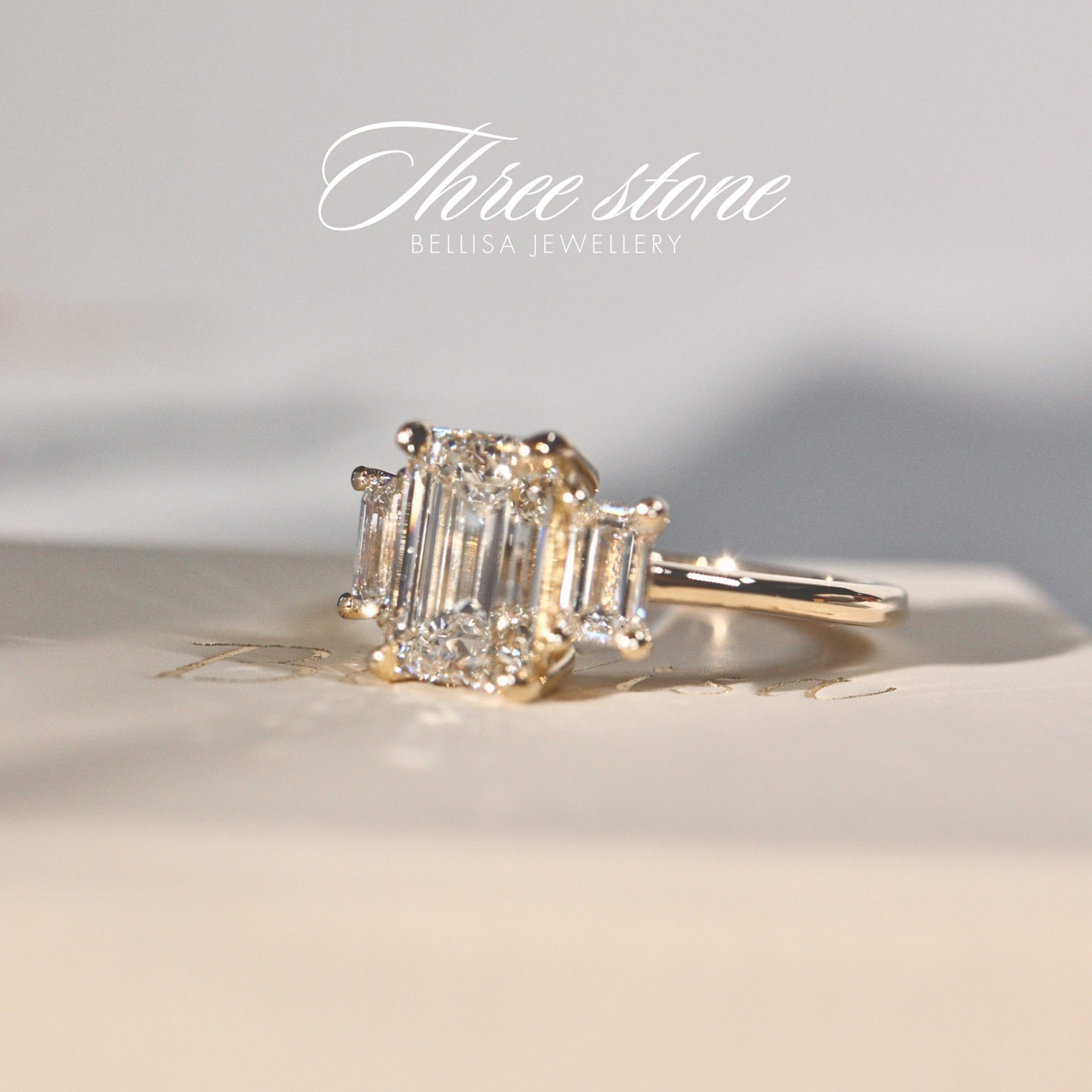 Evelyn Emerald Cut Three Stone Engagement Ring, Low Set