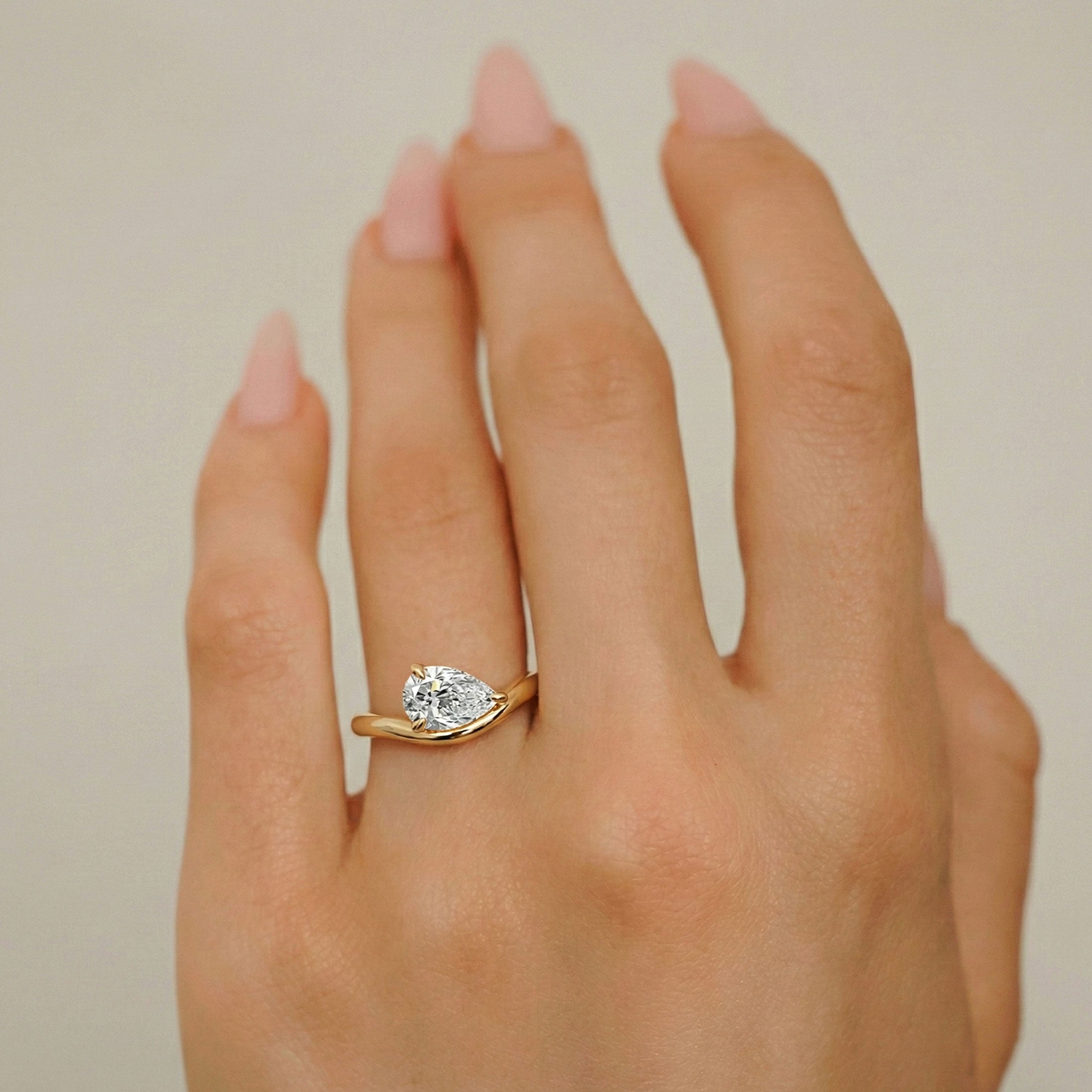 Orla Pear Curved Band Solitaire Engagement Ring, Moissanite/Lab Grown Diamond