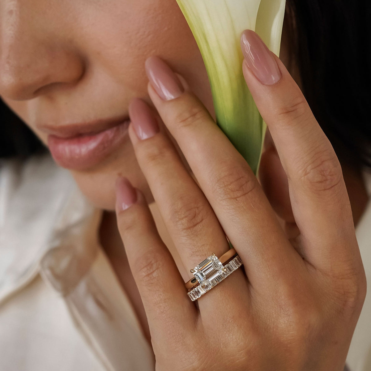 Lyra East West Emerald Cut Solitaire Cathedral Engagement Ring