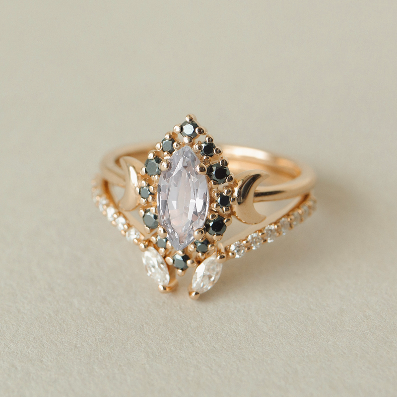 magic inspired black diamond halo ring