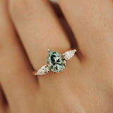 Purity Petal Hidden Halo Three Stone Engagement Ring, Cyan Green Moissanite