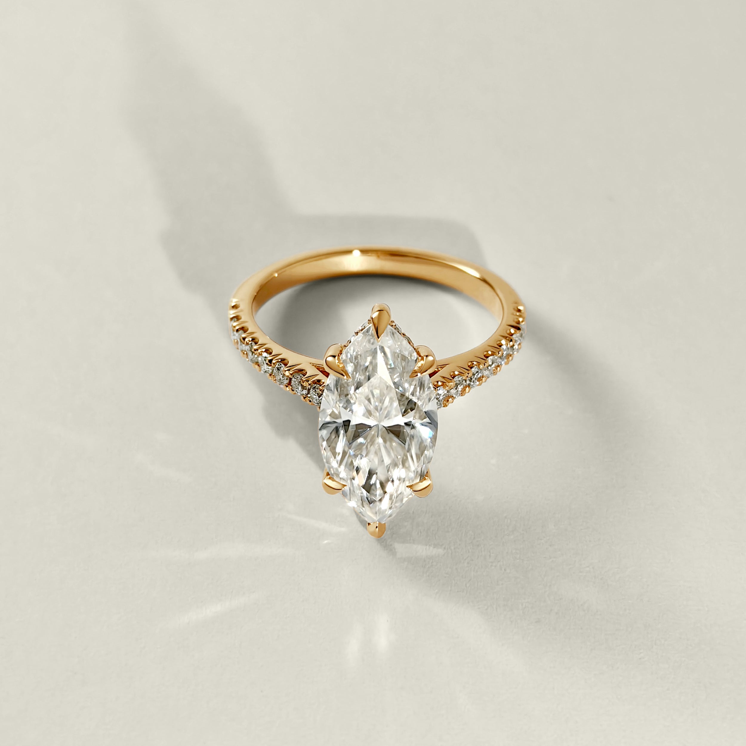 2.5CT MARQUISE MOISSANITE CATHEDRAL ENGAGEMENT RING WITH PAVE BAND IN YELLOW GOLD