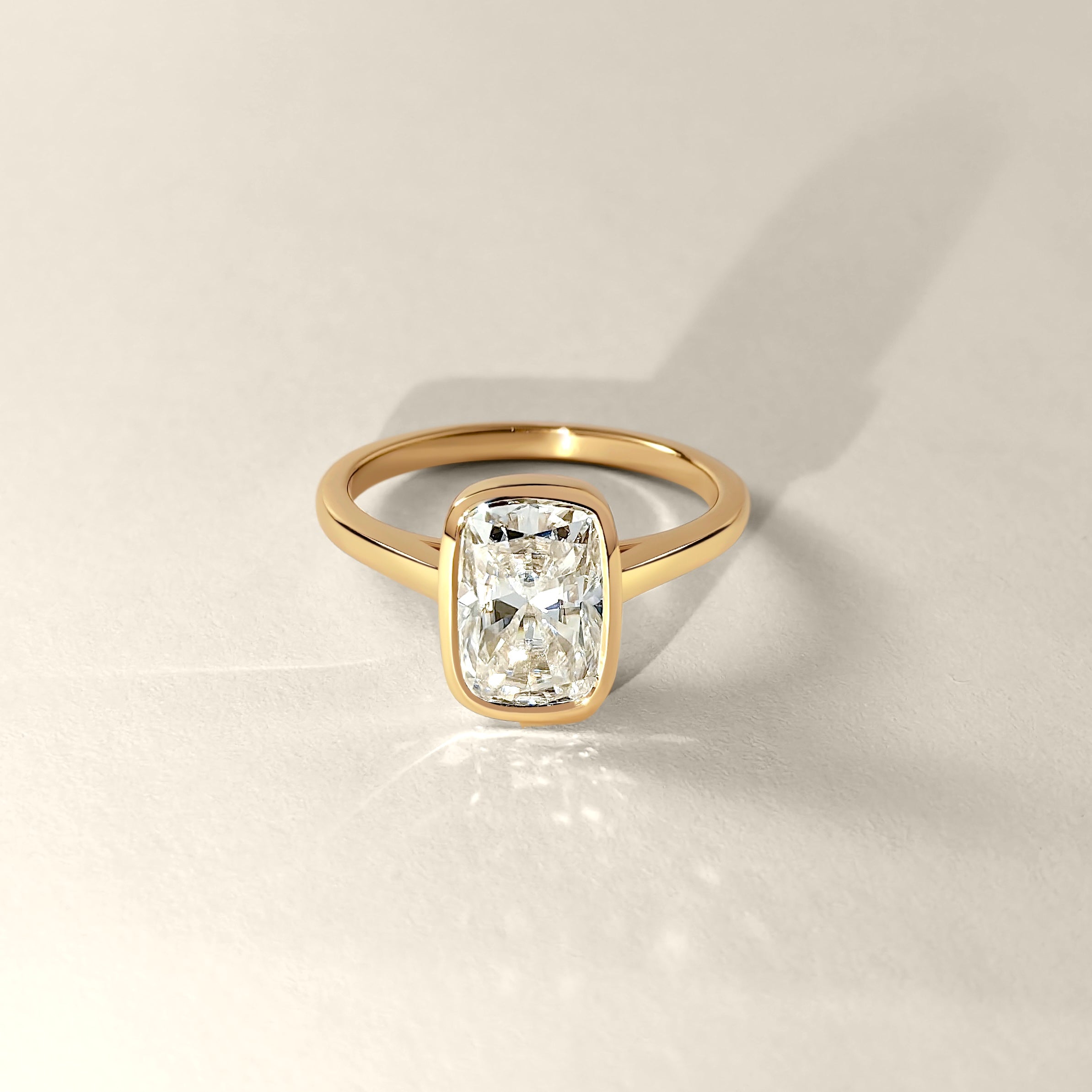 Carmen Elongated Cushion Bezel Solitaire Cathedral Engagement Ring