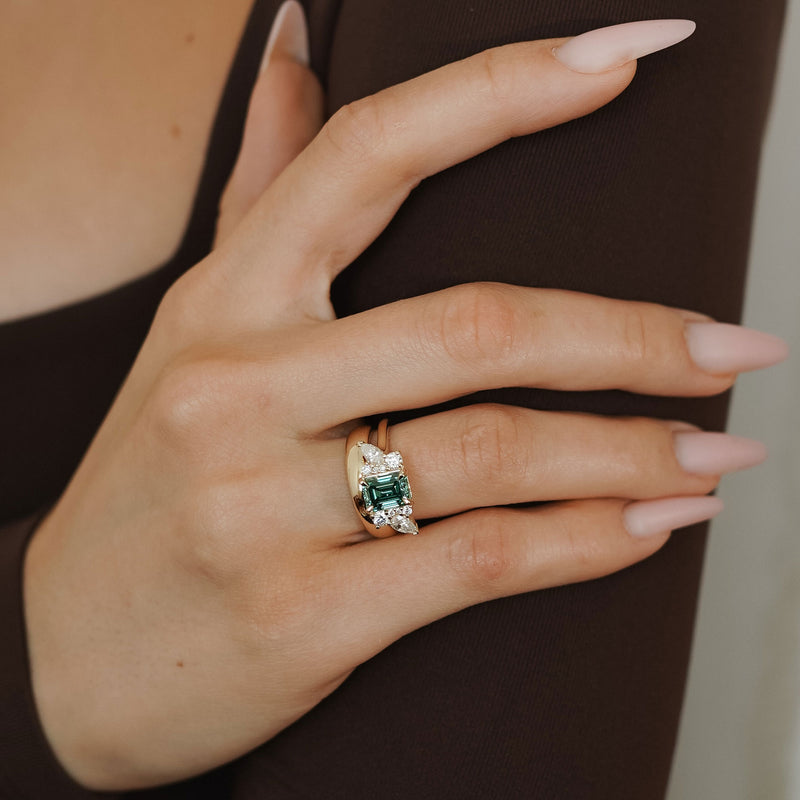 Meghan Emerald Cut Asymmetric Cluster Engagement Ring