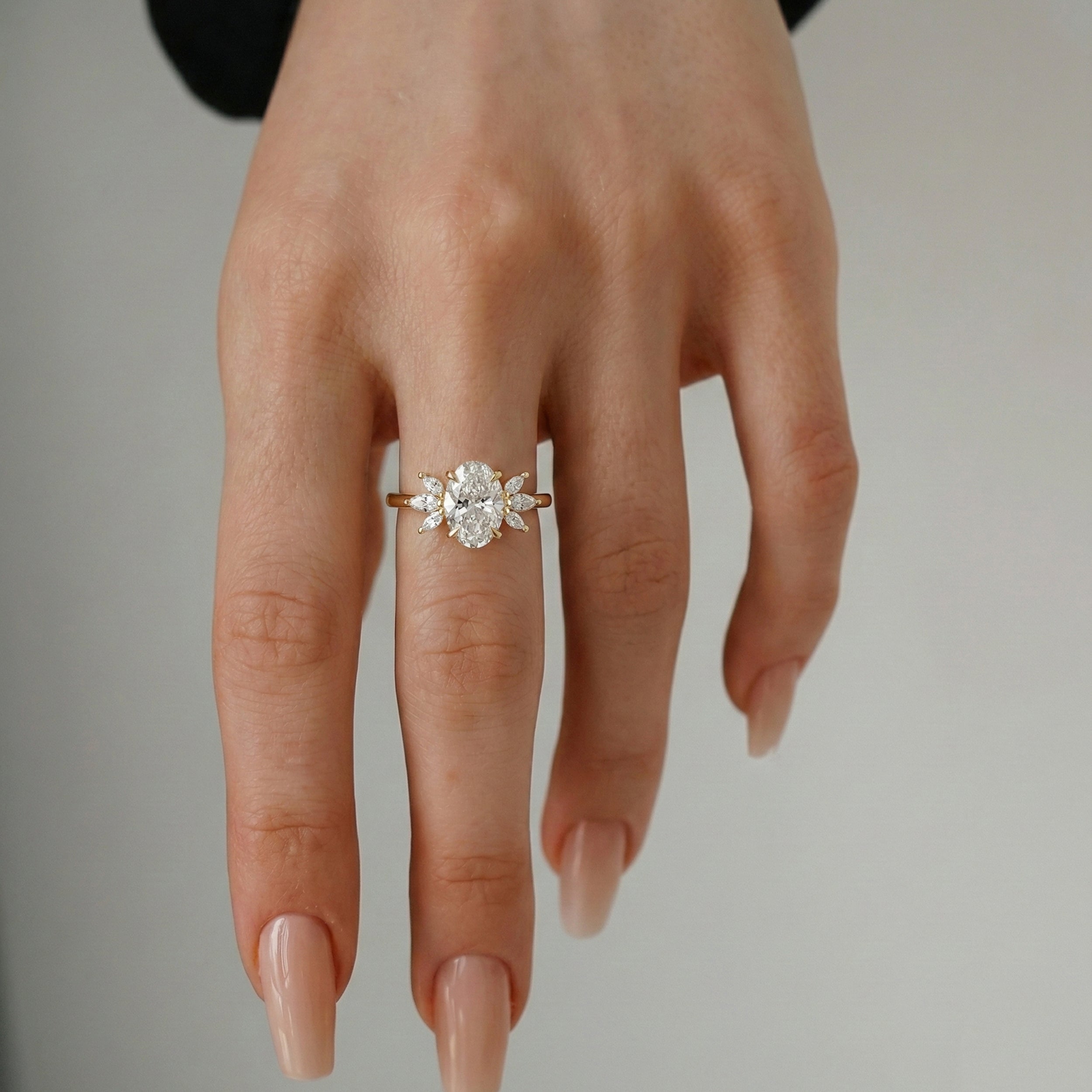 Oval Wings of Love Cluster Marquise Engagement Ring