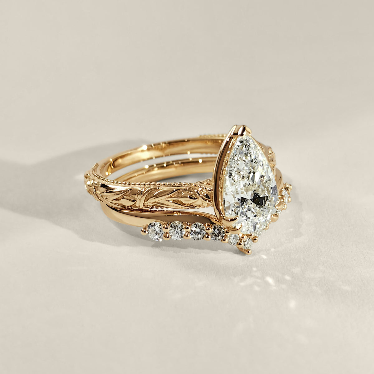 Pear-Diamond-Tulip-Inspired-Cathedral-Engagement-Ring