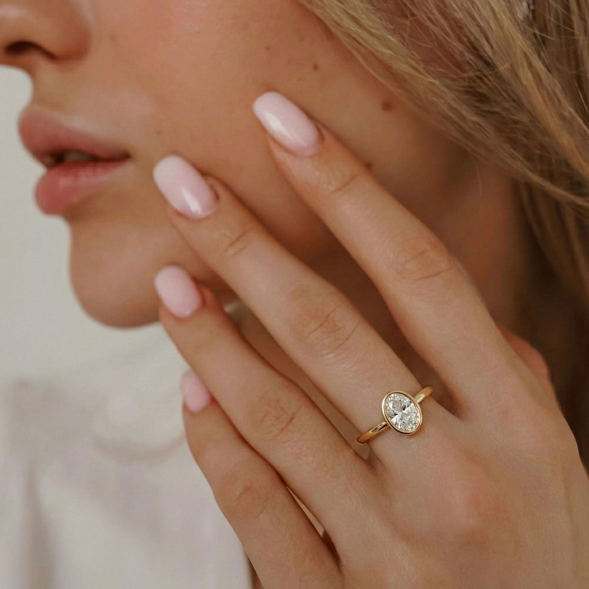 Carmen Oval Cut Full Bezel Cathedral Solitaire Engagement Ring