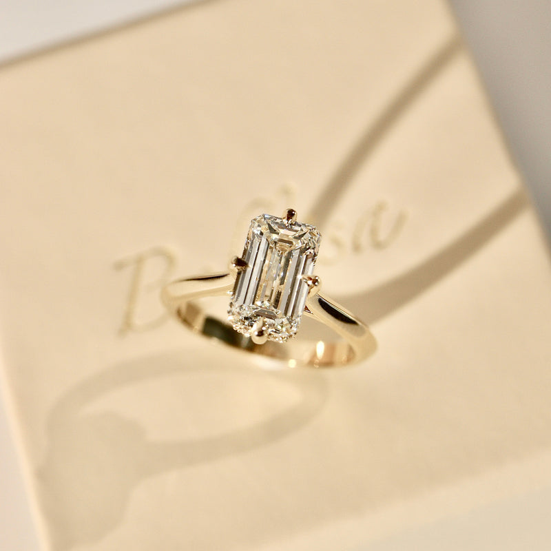 Jodie Compass Emerald Cut Hidden Halo Engagement Ring