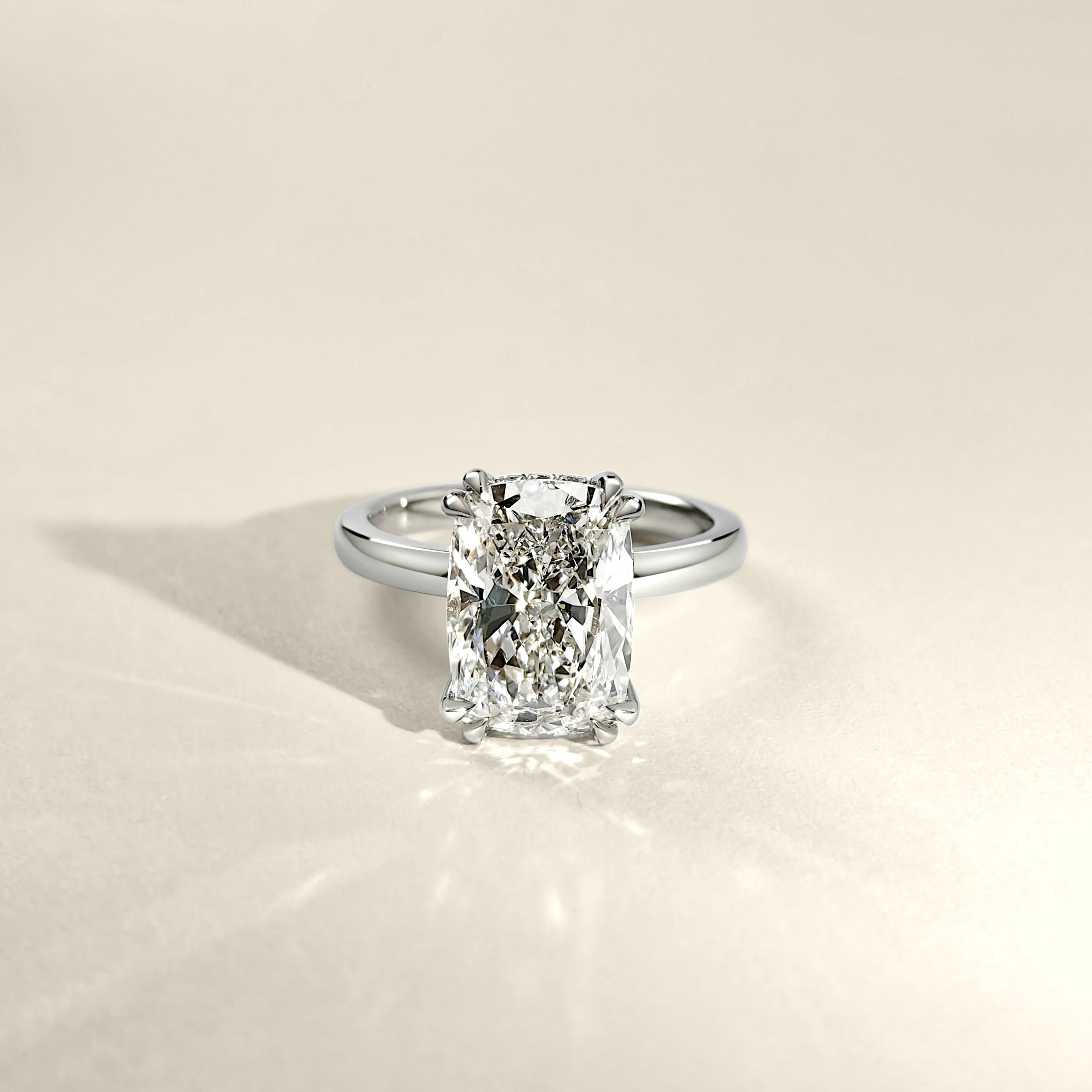 elongated cushion cut diamond solitaire engagement ring
