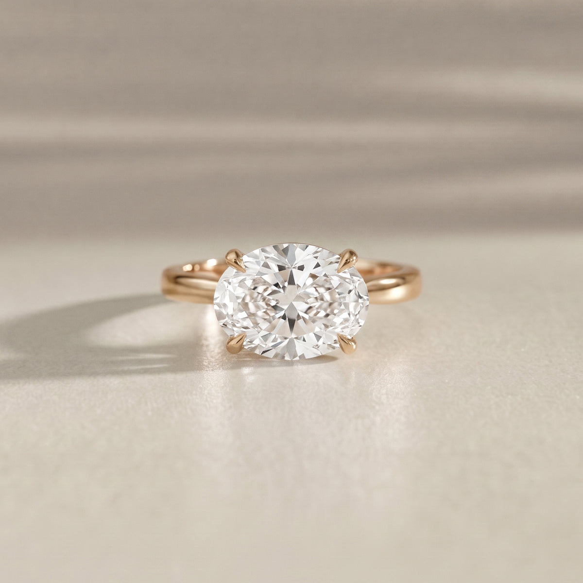 oval engagement ring in yellow gold solitaire design