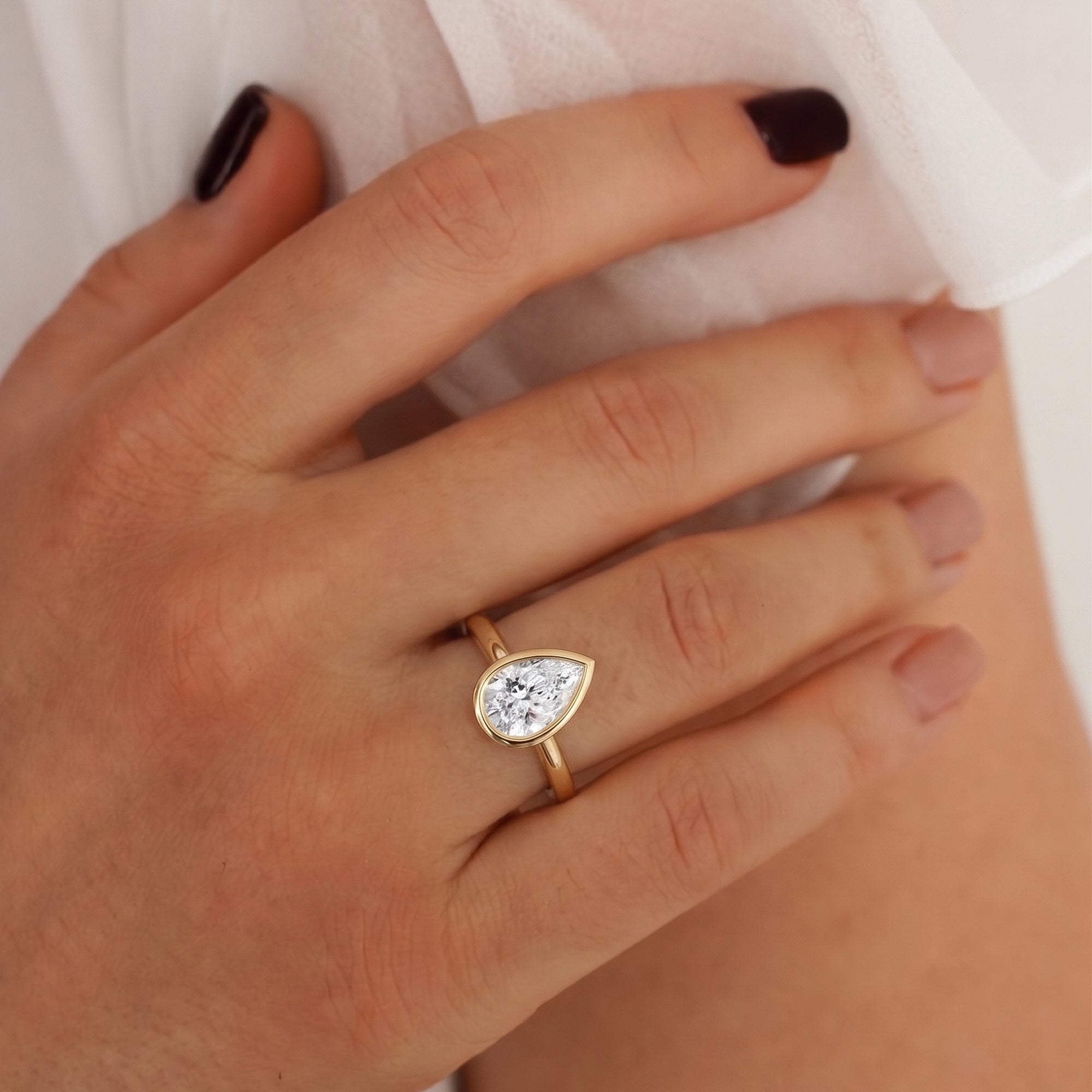 Carmen Pear Cut Bezel Solitaire Engagement Ring
