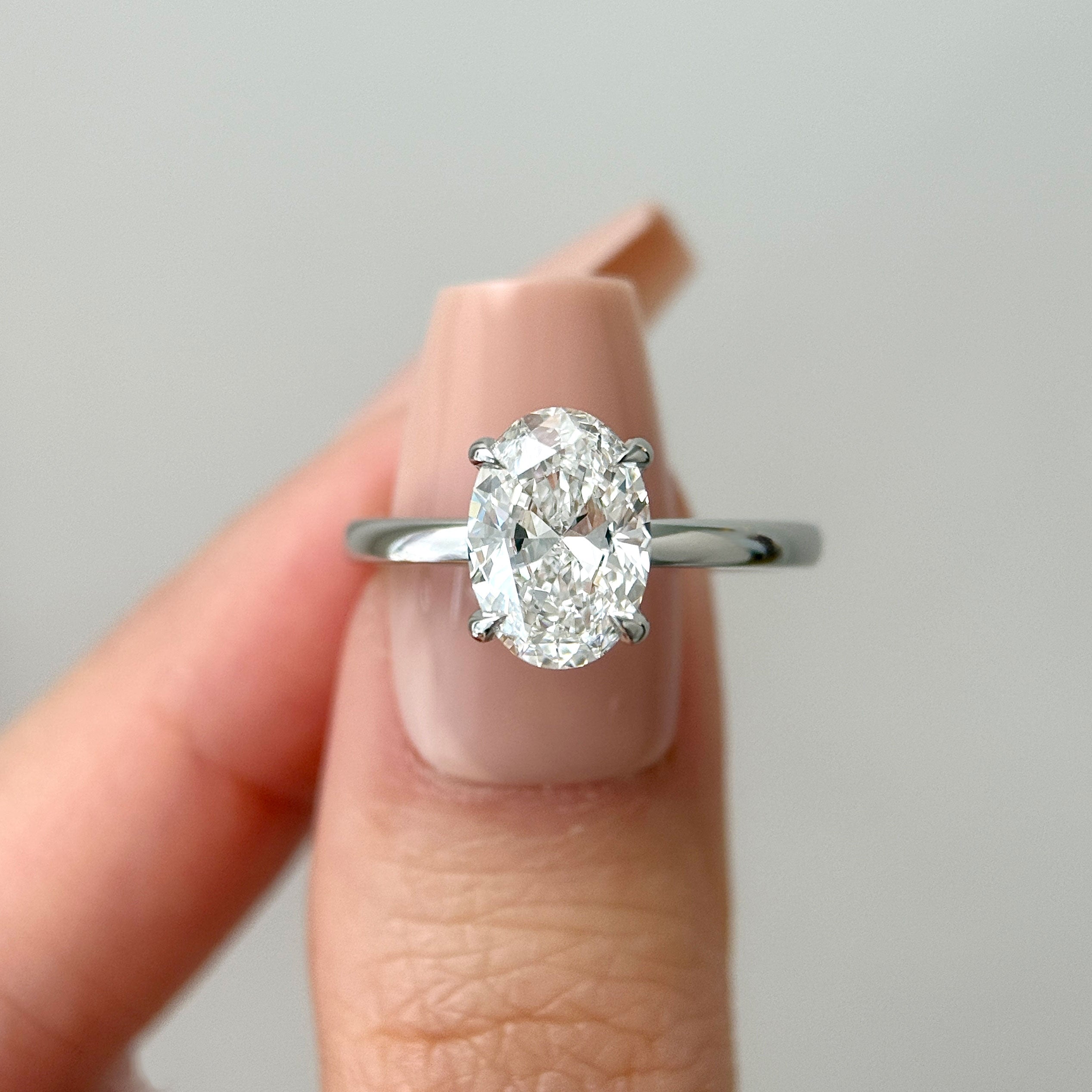 The Petal Oval Hidden Halo Solitaire Engagement Ring, Moissanite/Lab Grown Diamond