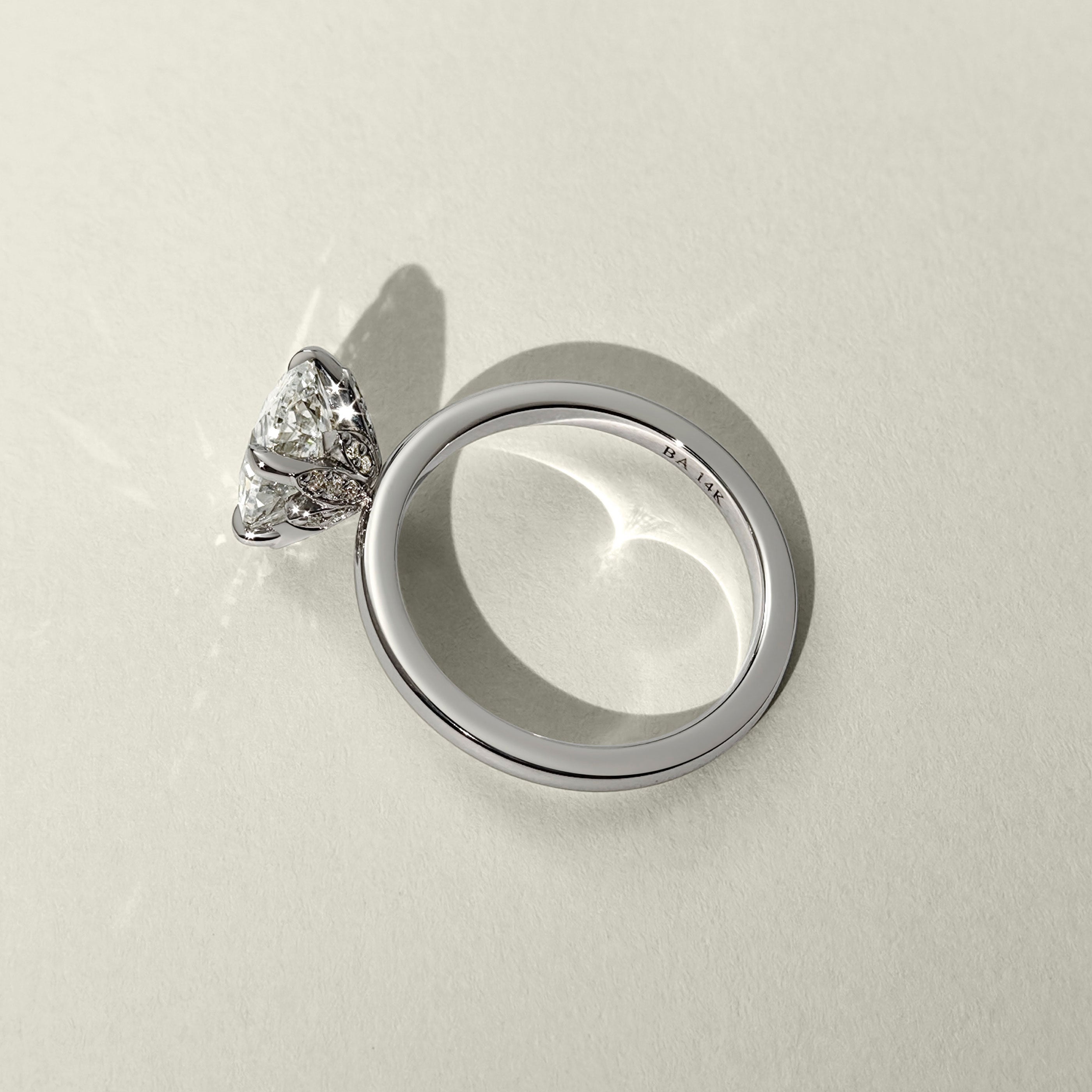 The Petal Hidden Halo Oval Engagement Ring