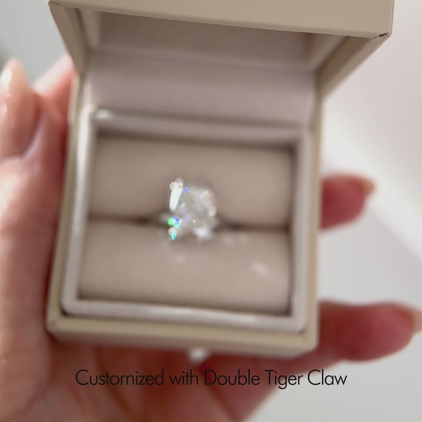 elongated cushion cut solitaire engagement ring with double tiger claw