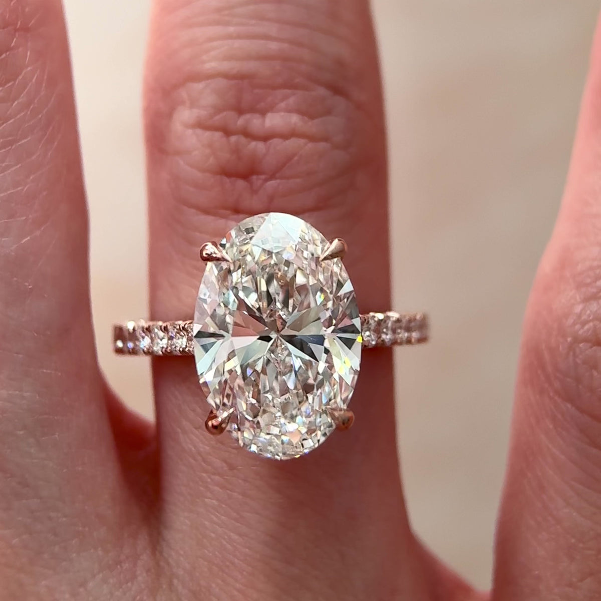 oval lab grown diamond cathedral engagement ring