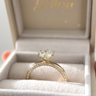 round diamond tulip basket solitaire engagement ring with side profile pave band