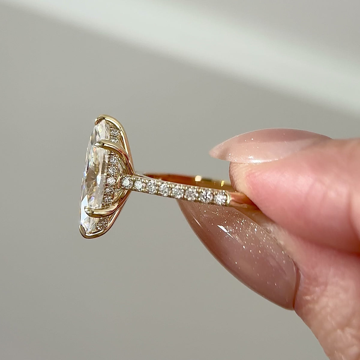 2ct marquise moissanite cathedral engagement ring with pave band