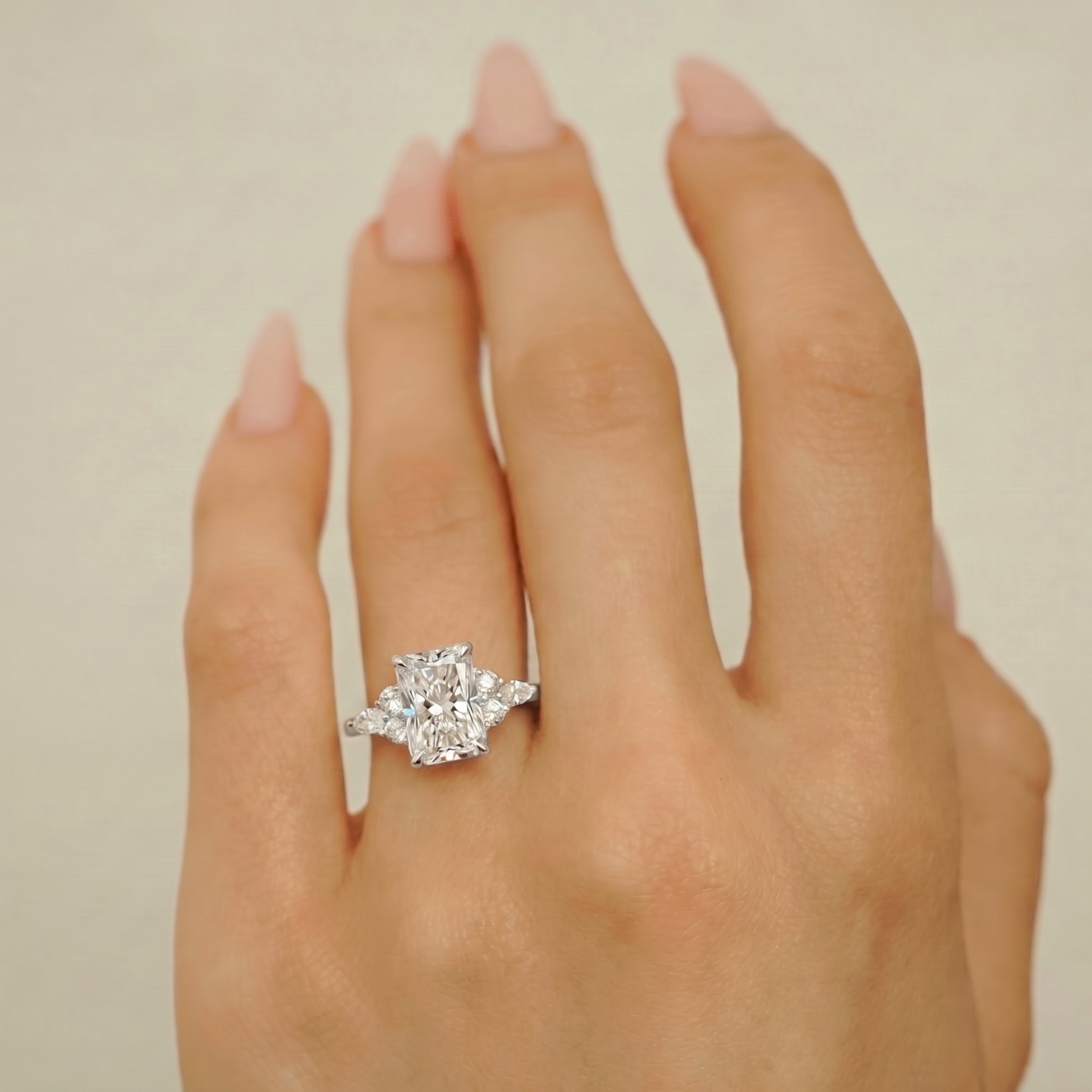 radiant-cut-diamond-cluster-ring-in-white-gold