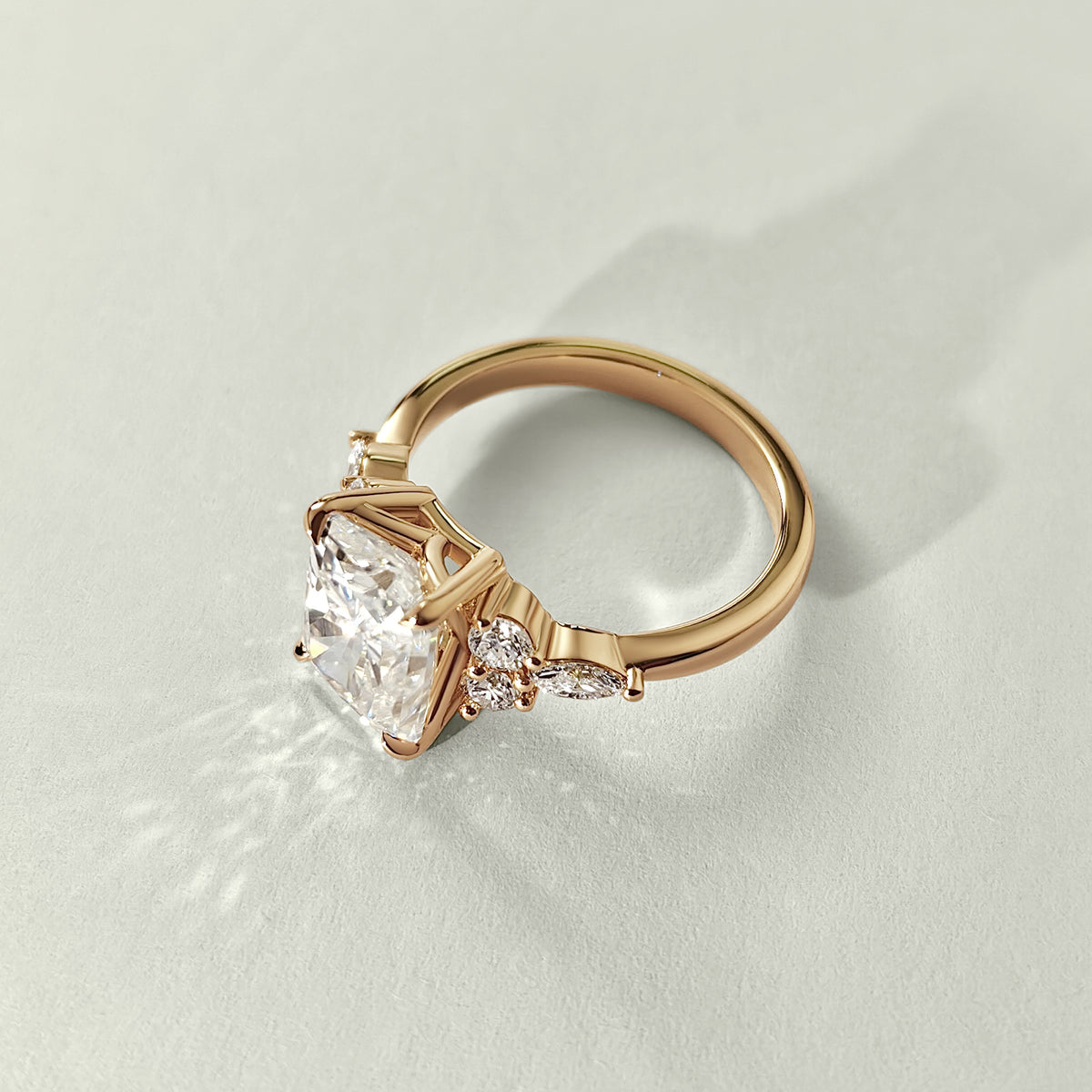radiant-cut-moissanite-trellis-cluster-engagement-ring