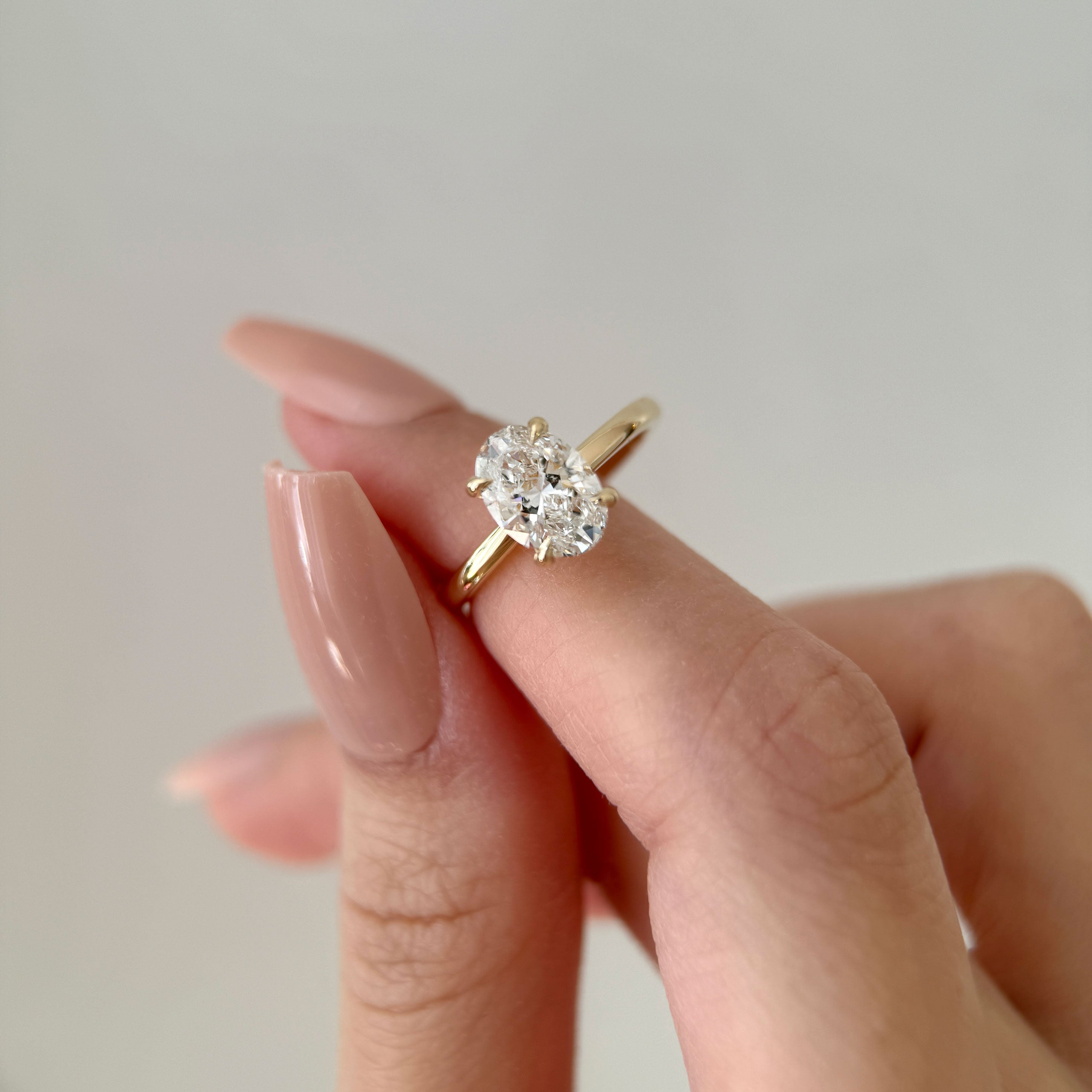 The Petal Oval Hidden Halo Solitaire Engagement Ring, Moissanite/Lab Grown Diamond