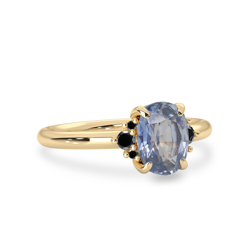 Oval cut Blue Sapphire Solitaire Engagement Ring with black diamond accent