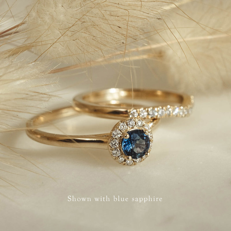 blue sapphire pave halo engagement ring